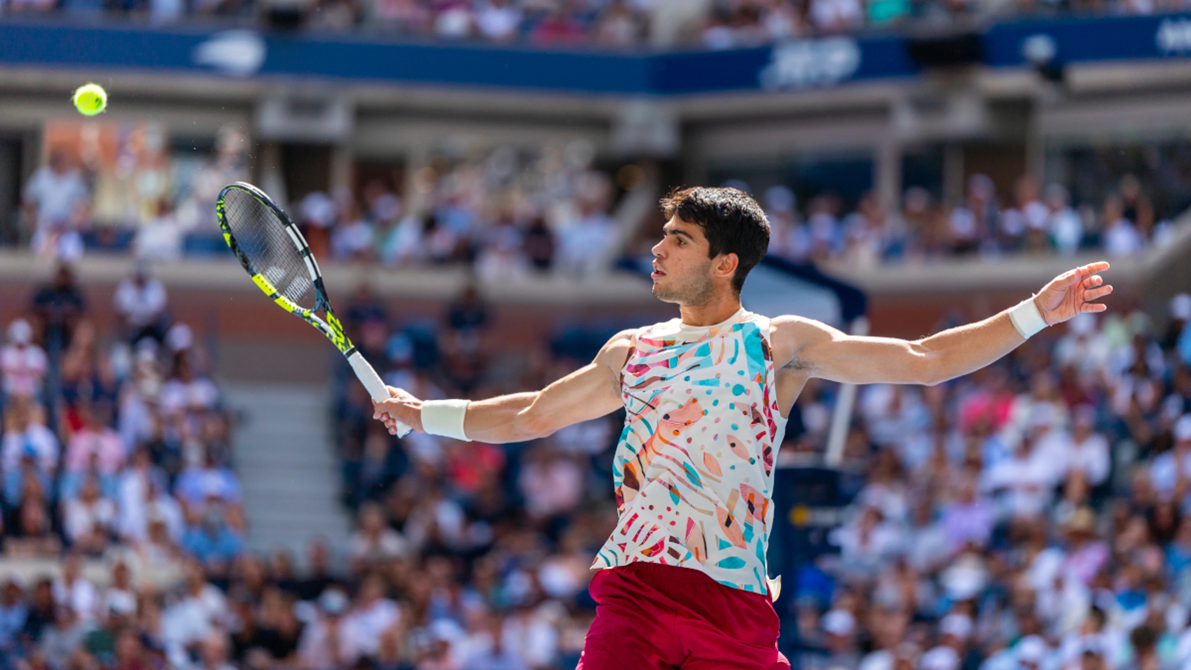 Alcaraz holds off Evans to reach US Open fourth round