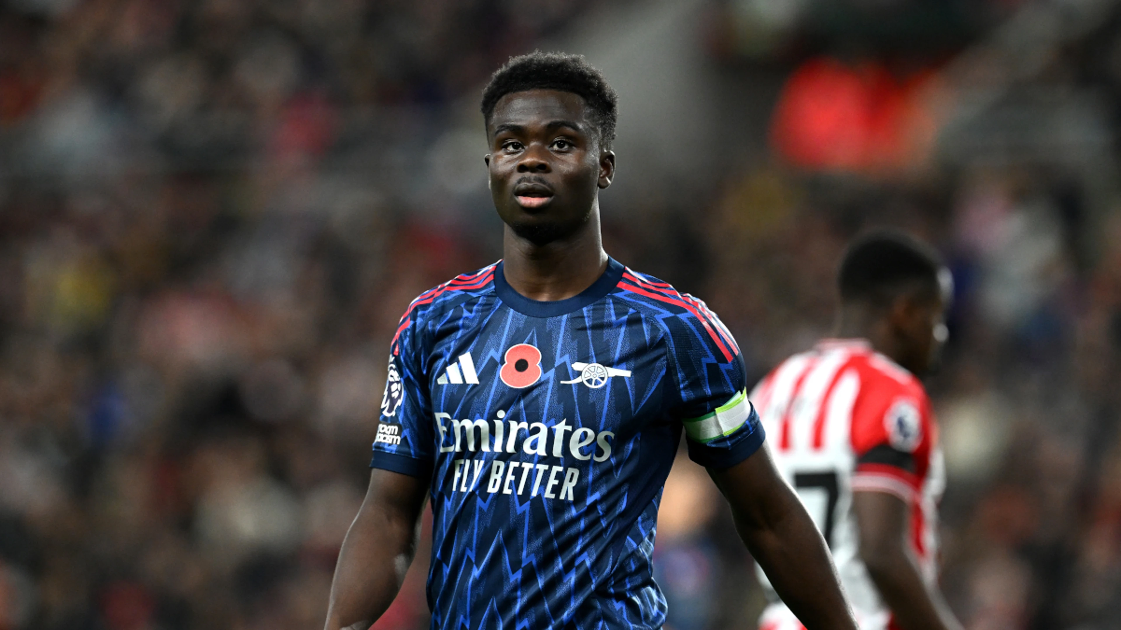 Arsenal's Saka dismisses early title talk