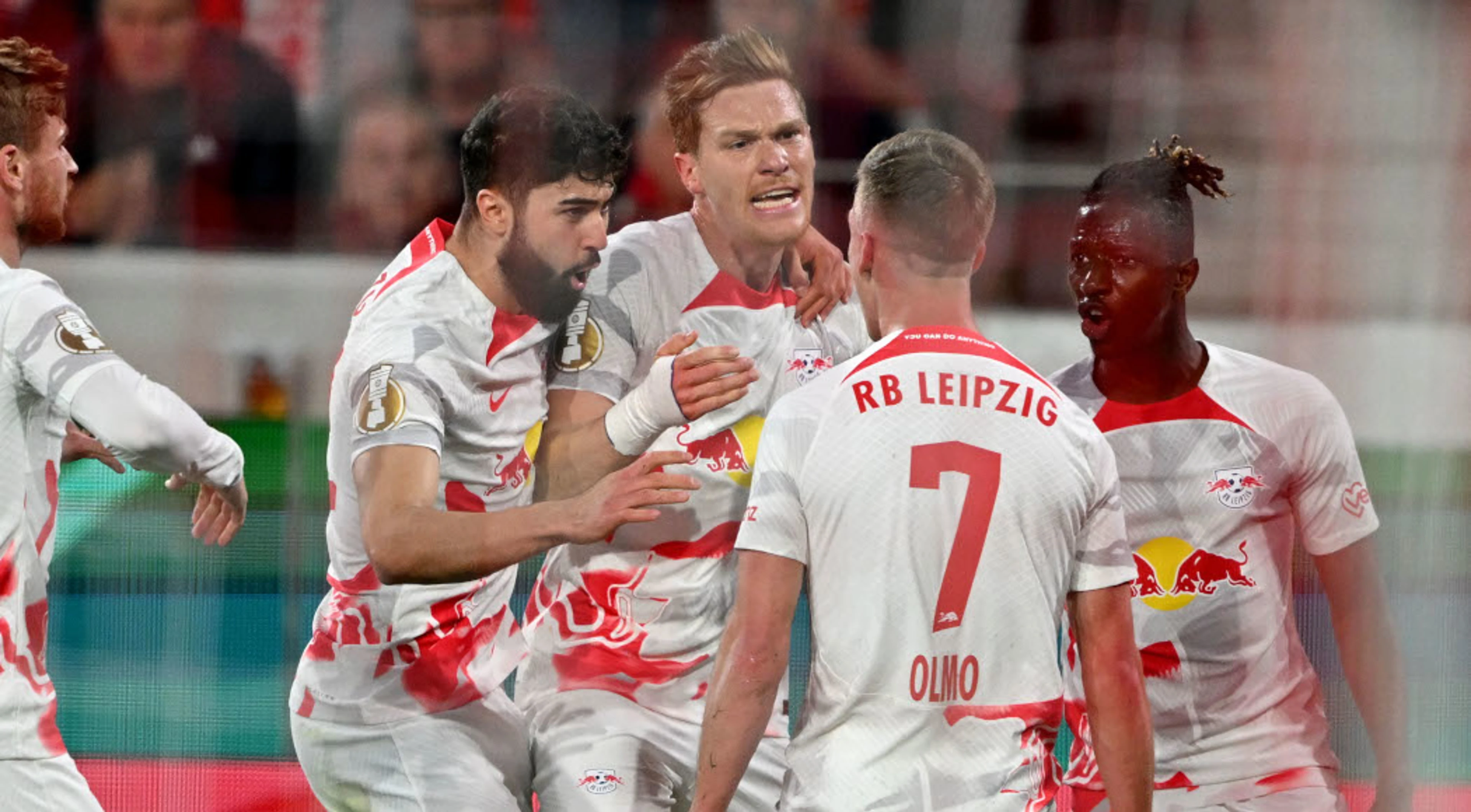 Outstanding Olmo steers ten-man Leipzig to German Cup final