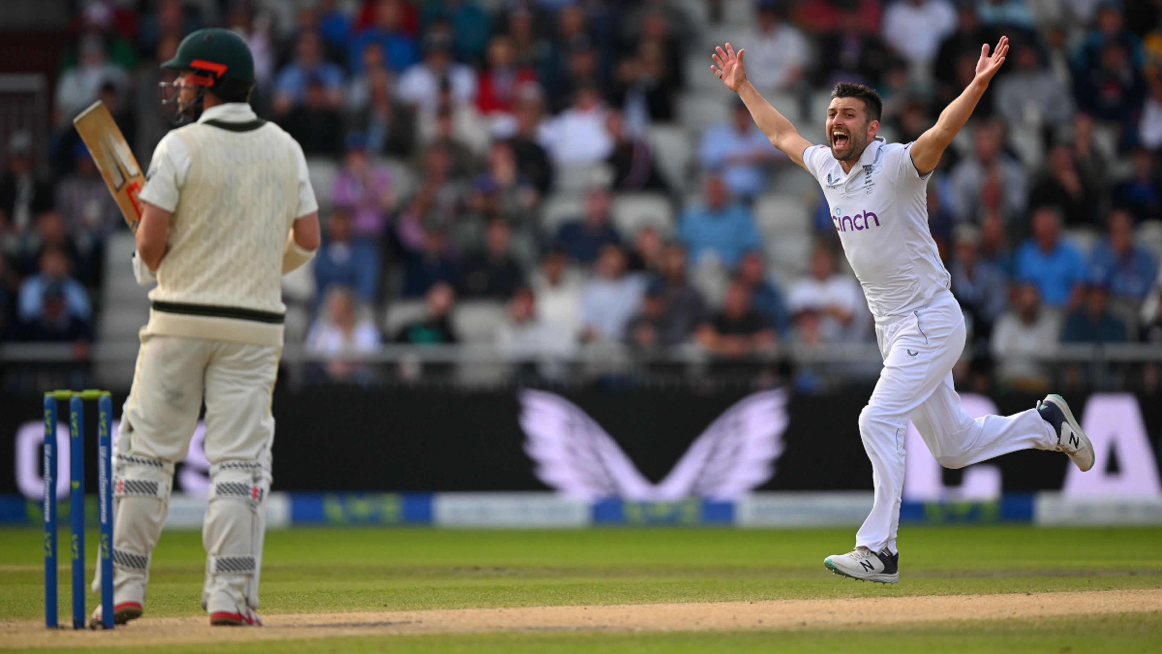 Wood strikes for England after Bairstow runs riot