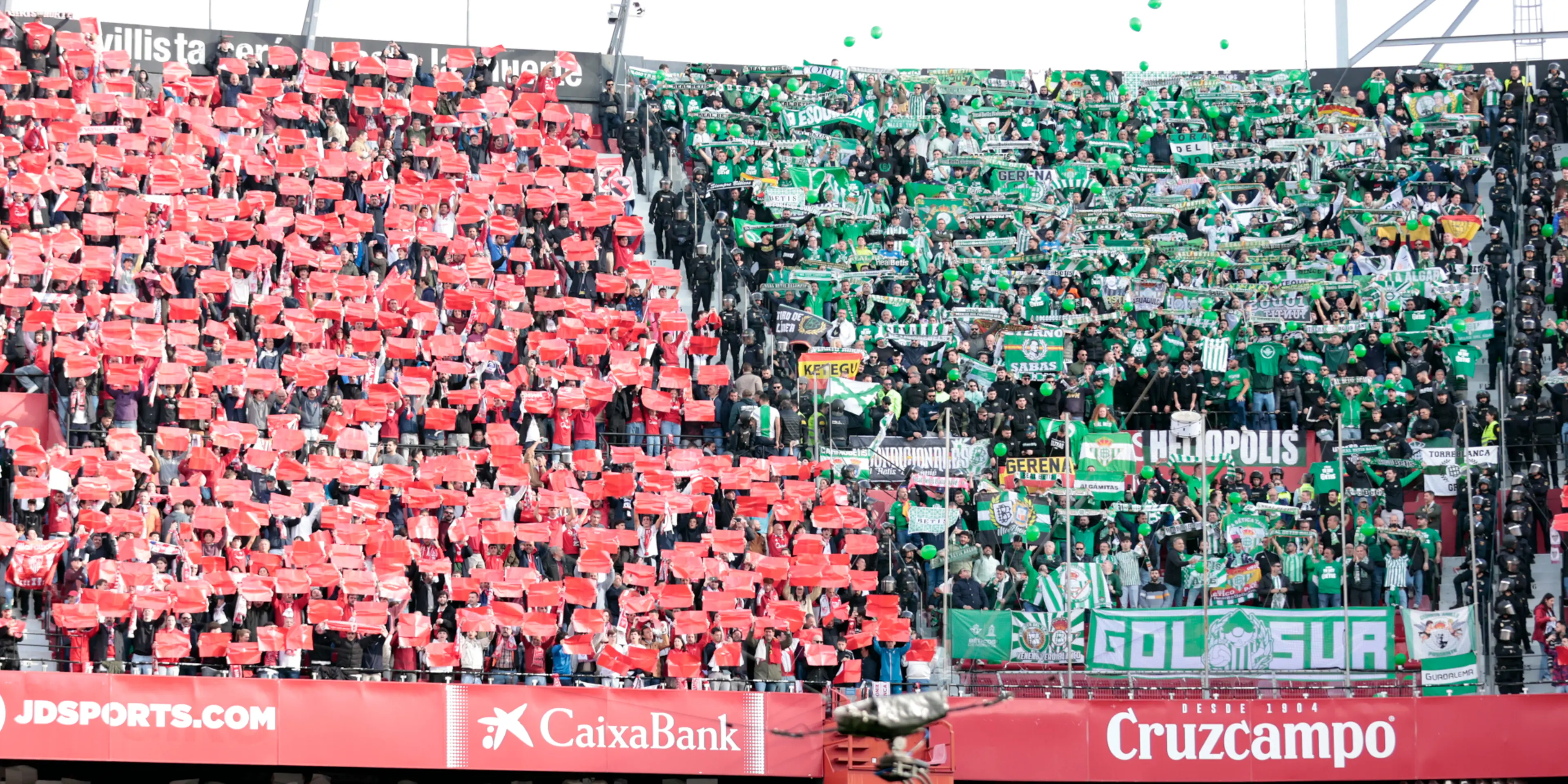 Sevilla stadium partially closed after fans throw objects in derby