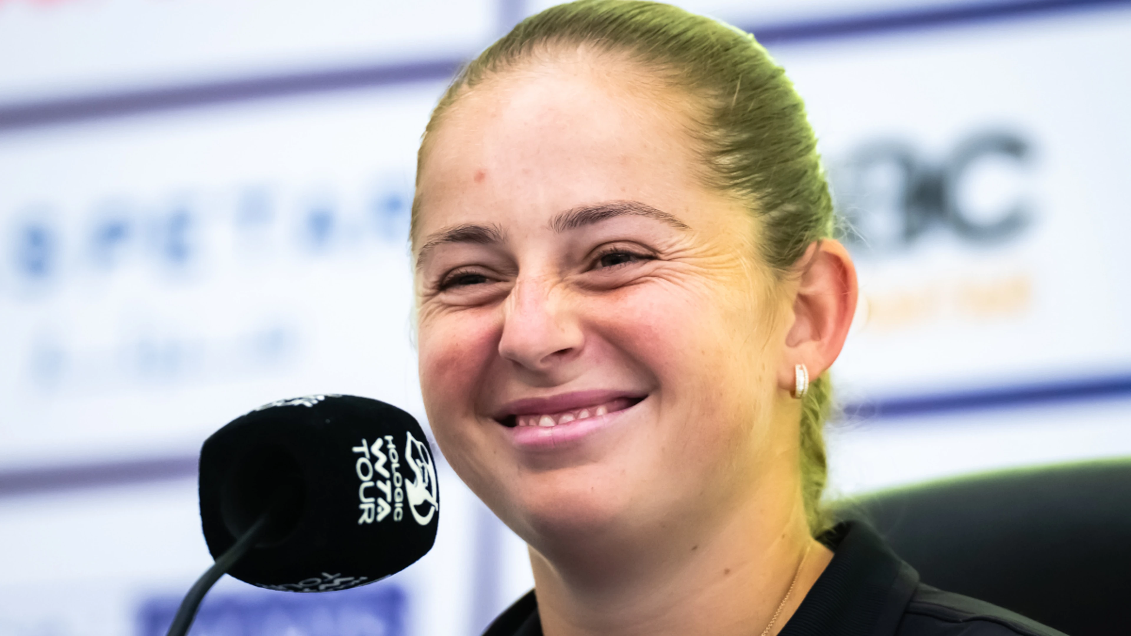 Ostapenko takes aim at partisan Doha crowd after beating Jabeur