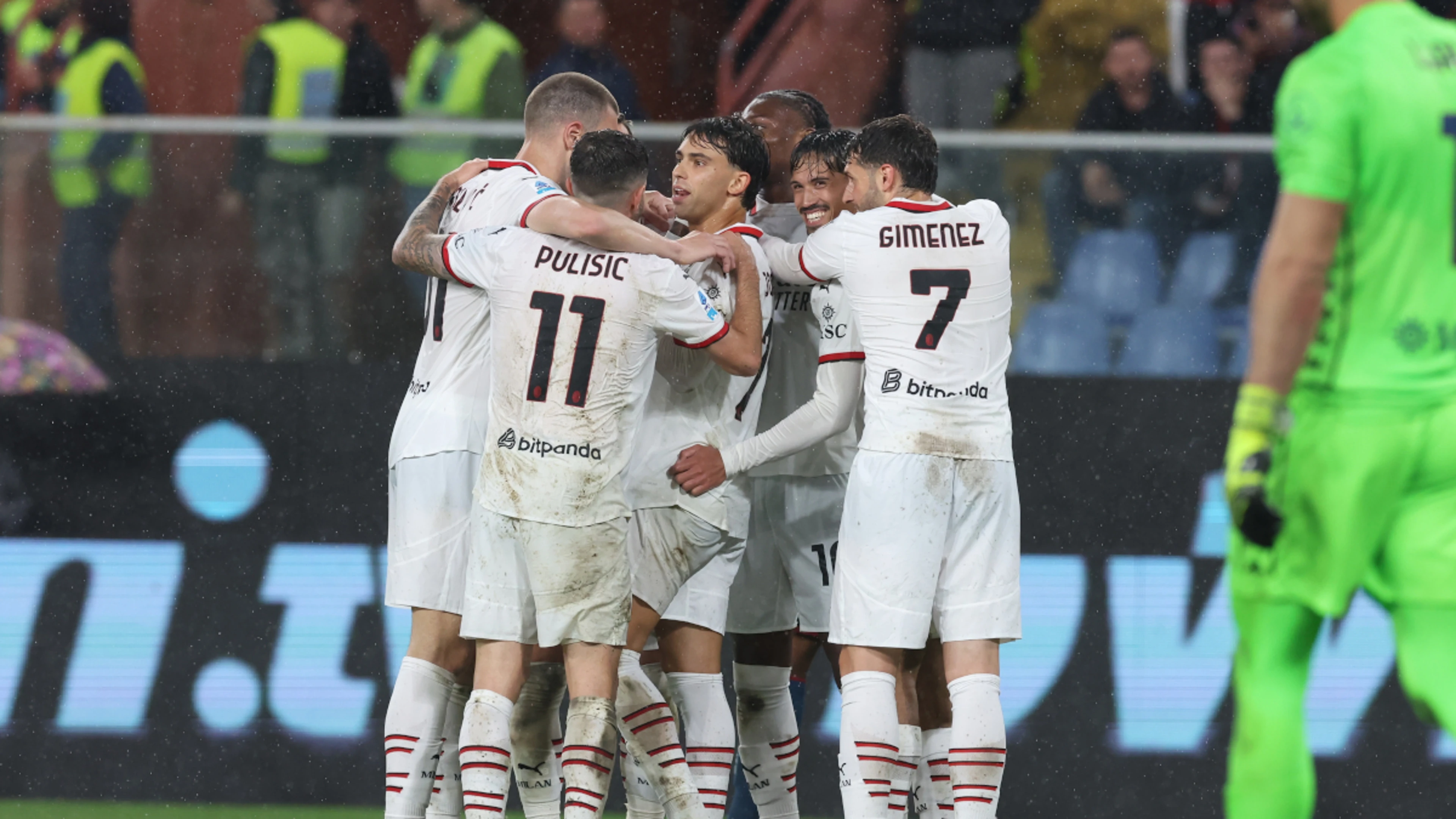 Milan clinch win with two quick-fire goals in rainy Genoa clash