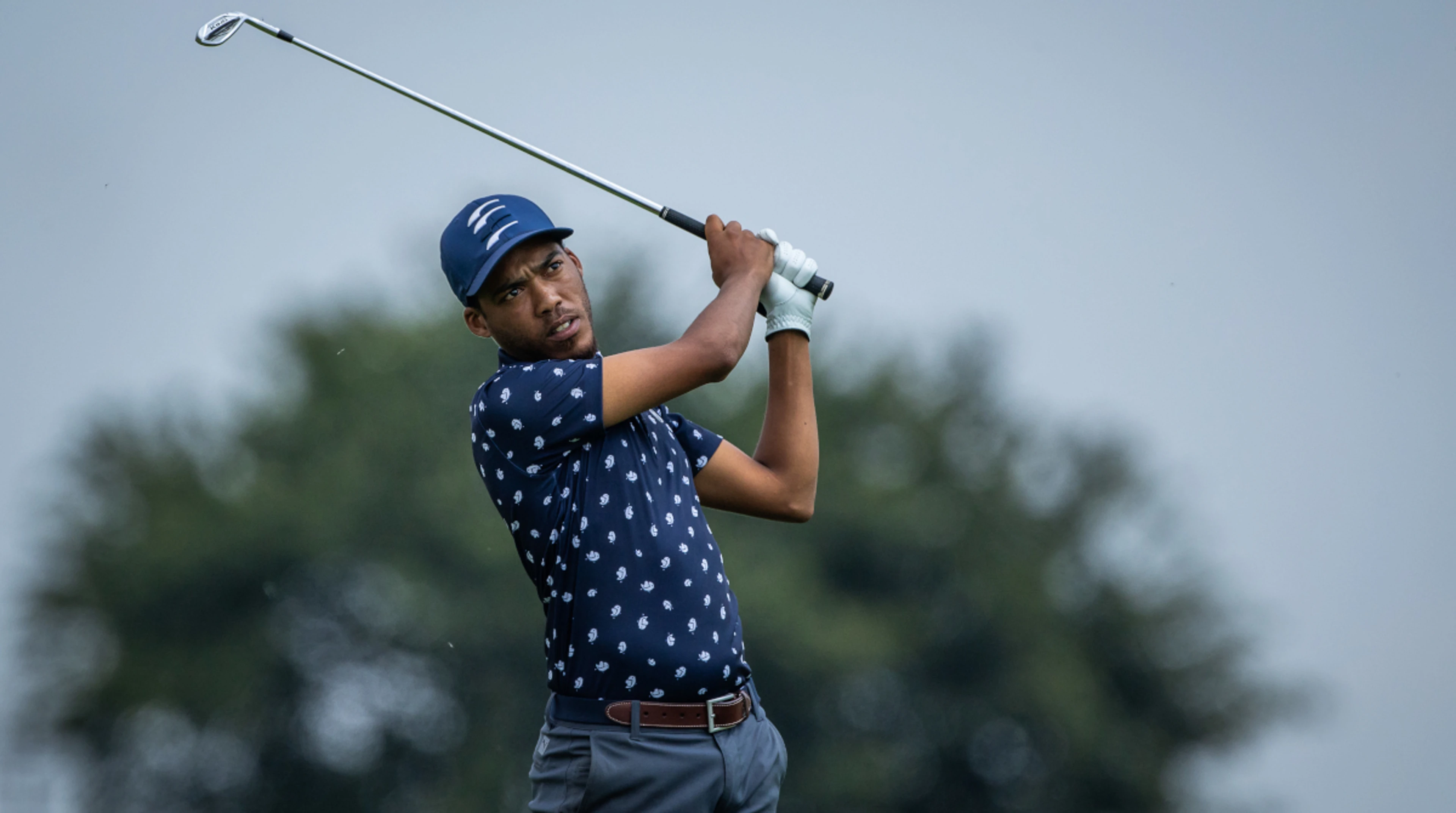 ROUND TWO WRAP: Blemish-free 63 hands Manchest slim lead