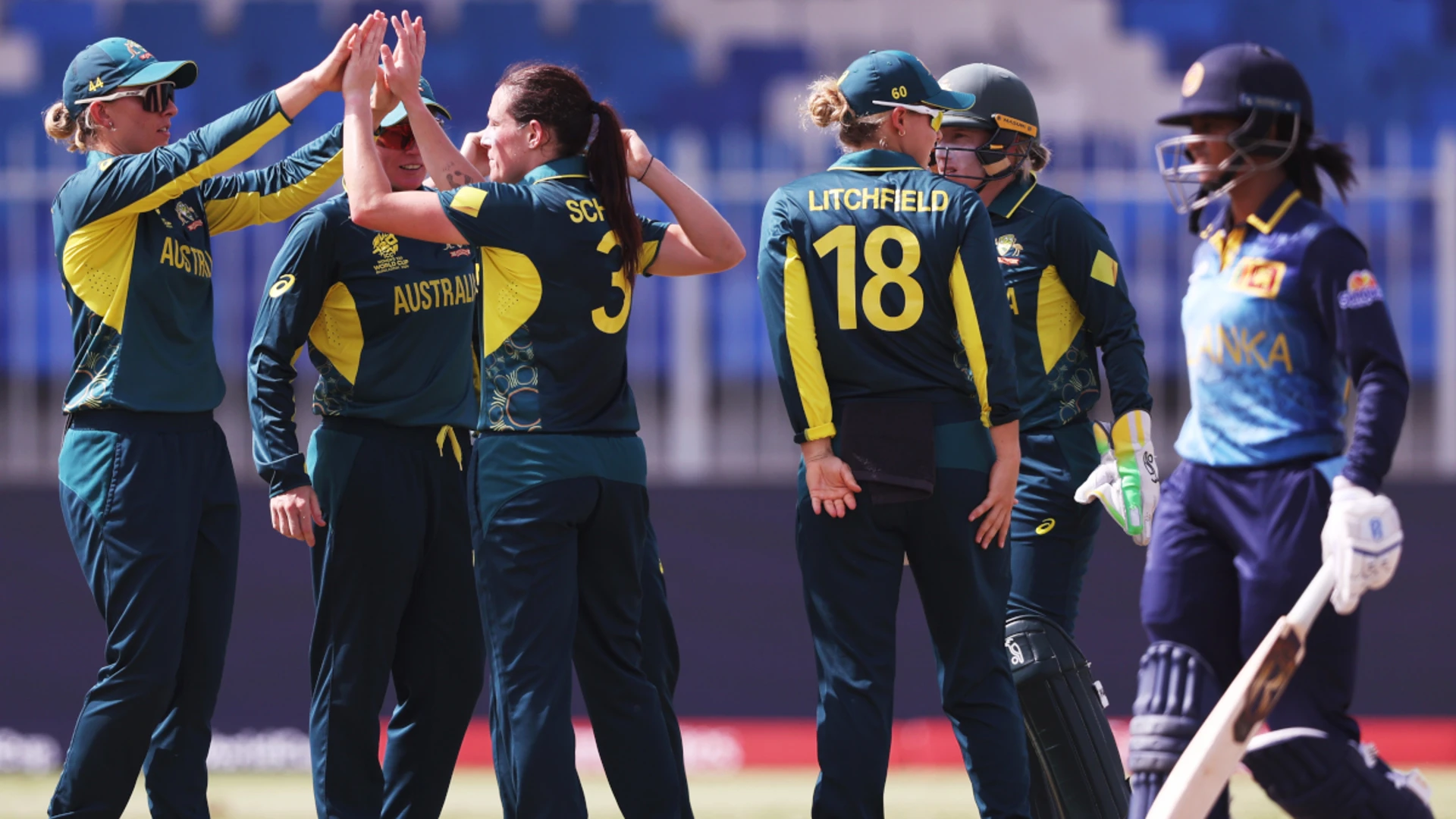 Defending champions Australia ease to victory over Sri Lanka