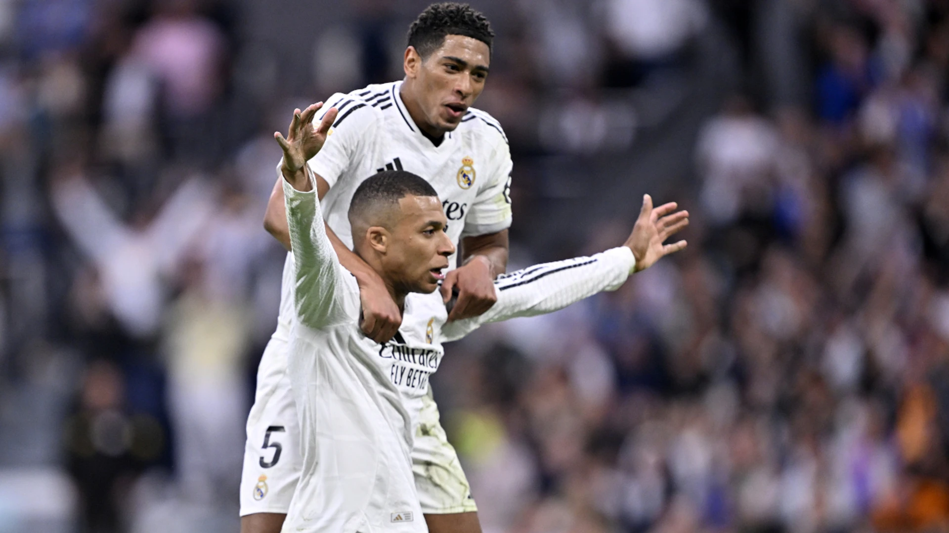 Mbappe double helps Real keep pressure on leaders Barca with win over Celta Vigo