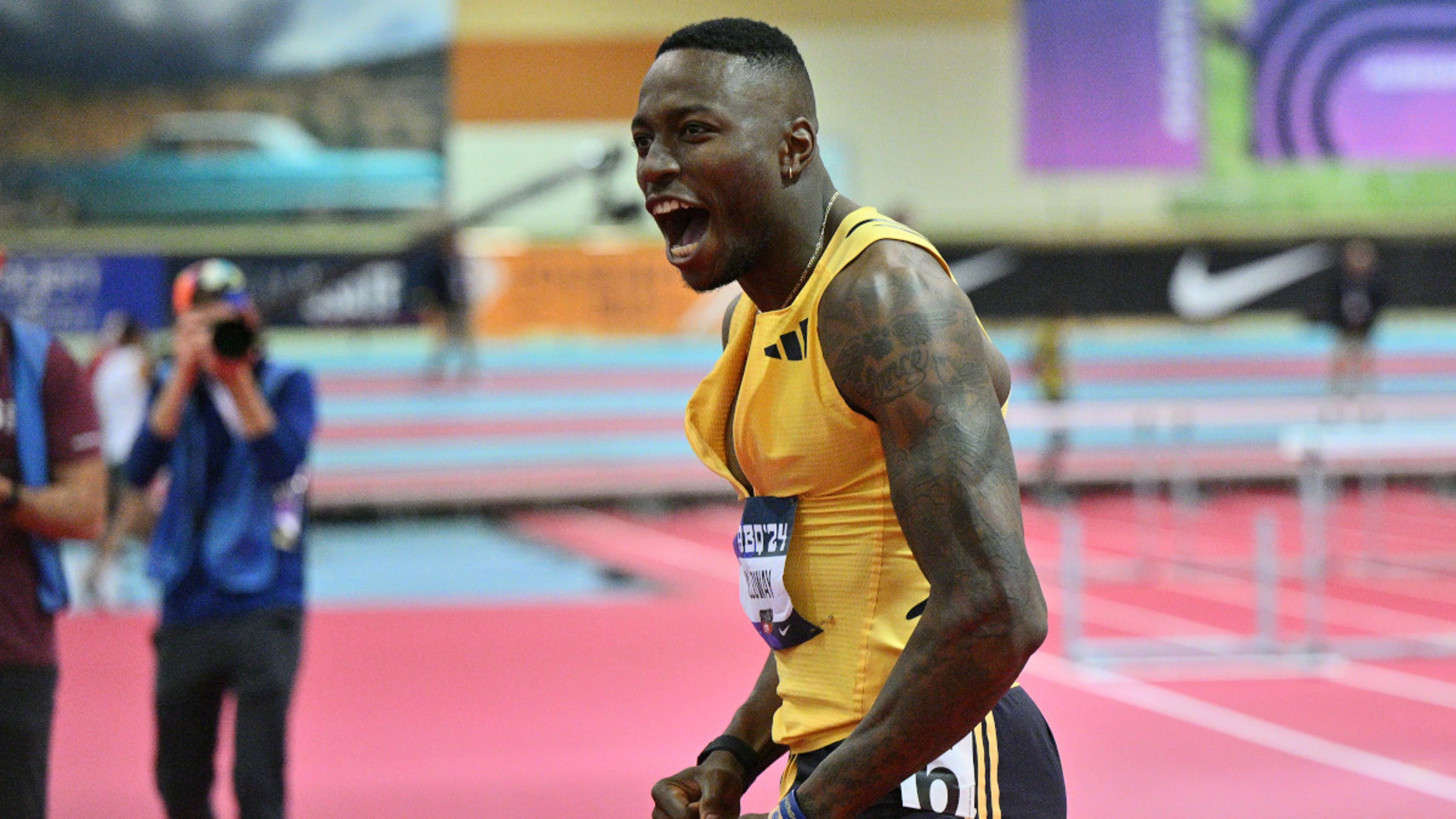 Holloway blasts to hurdles world record at US Indoors