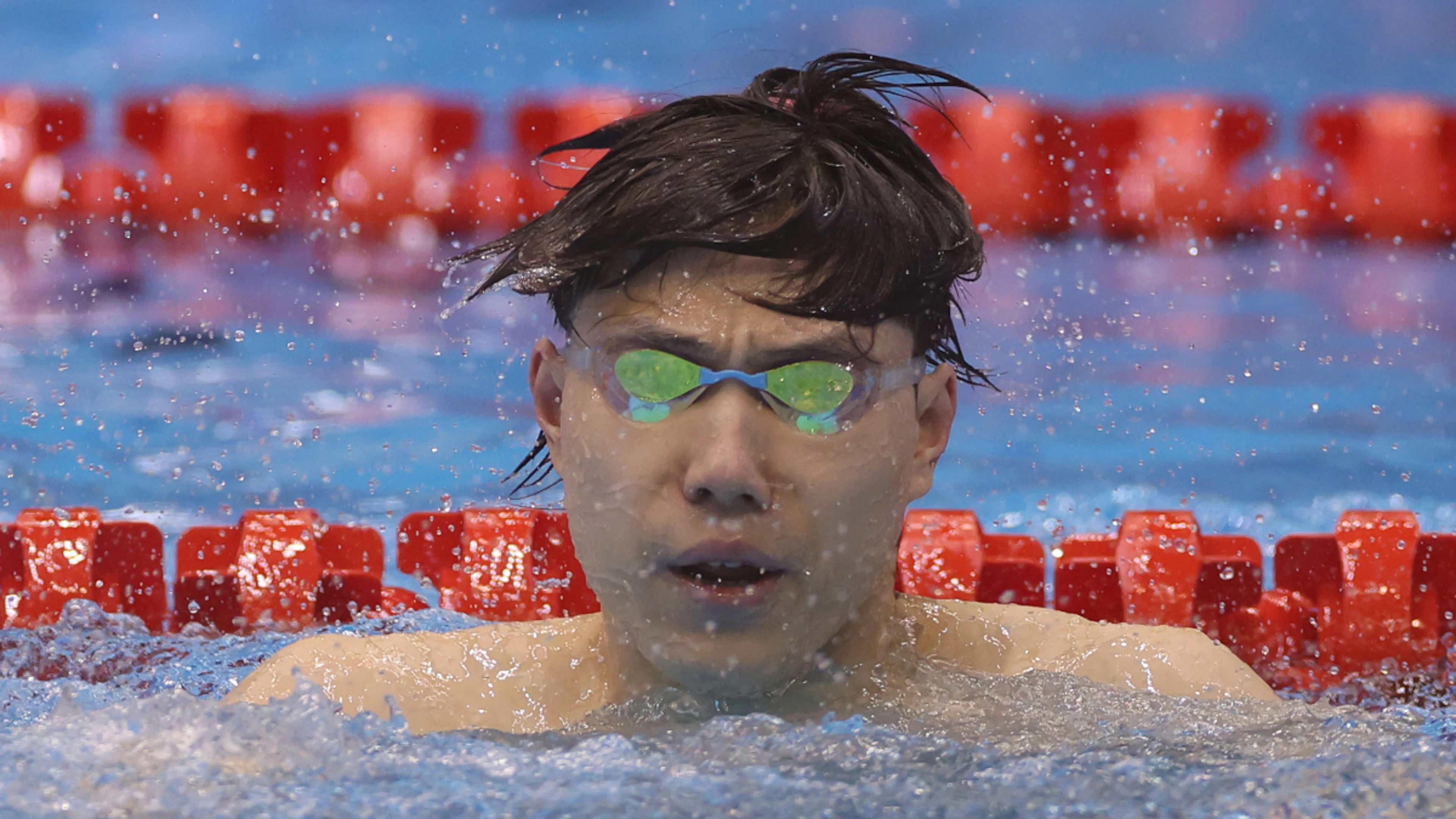 China's Qin wins men's 50m breaststroke world title