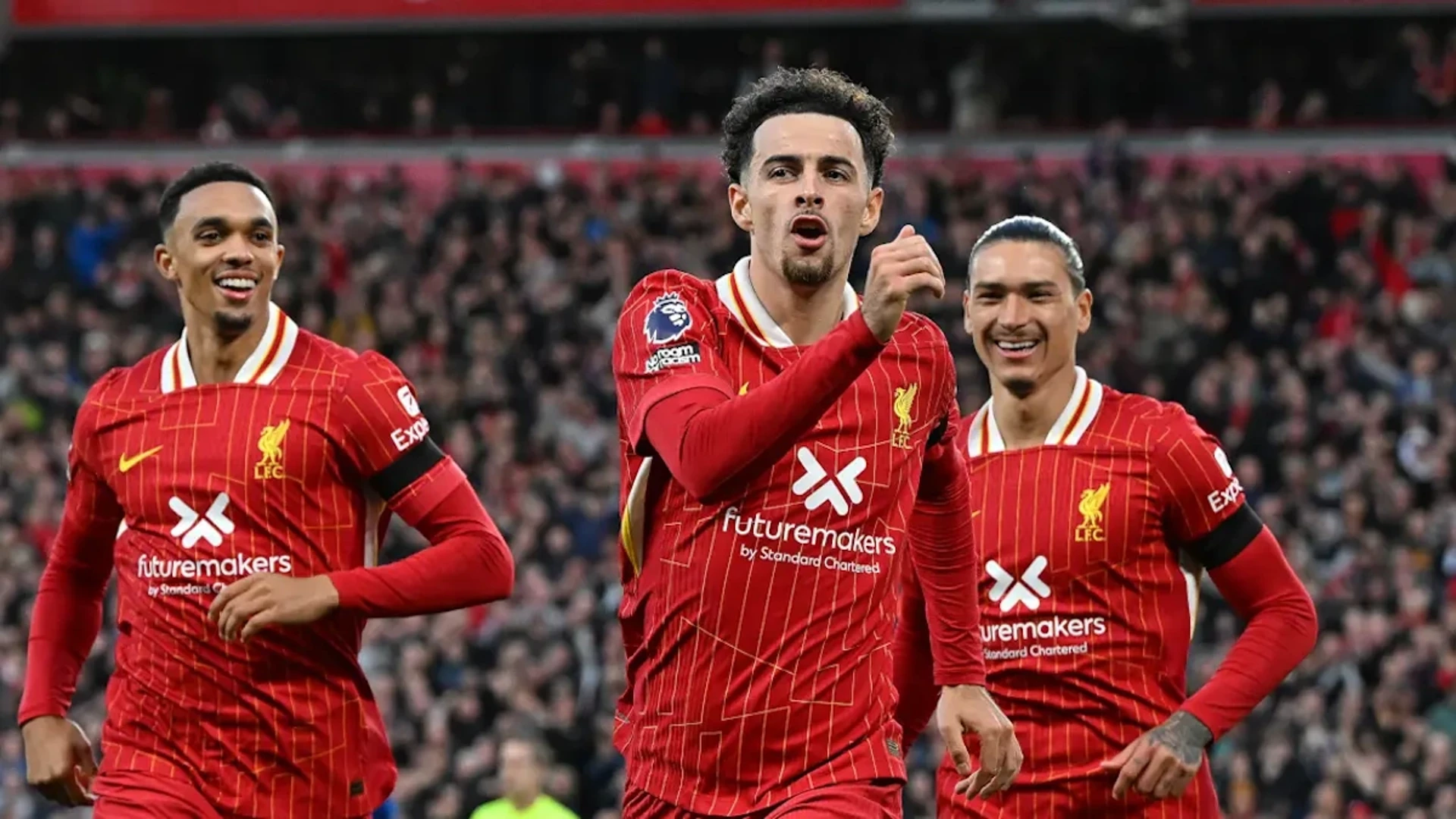 DEFENSIVE SKIPPER: Van Dijk defends Alexander-Arnold after Liverpool star's Man Utd flop