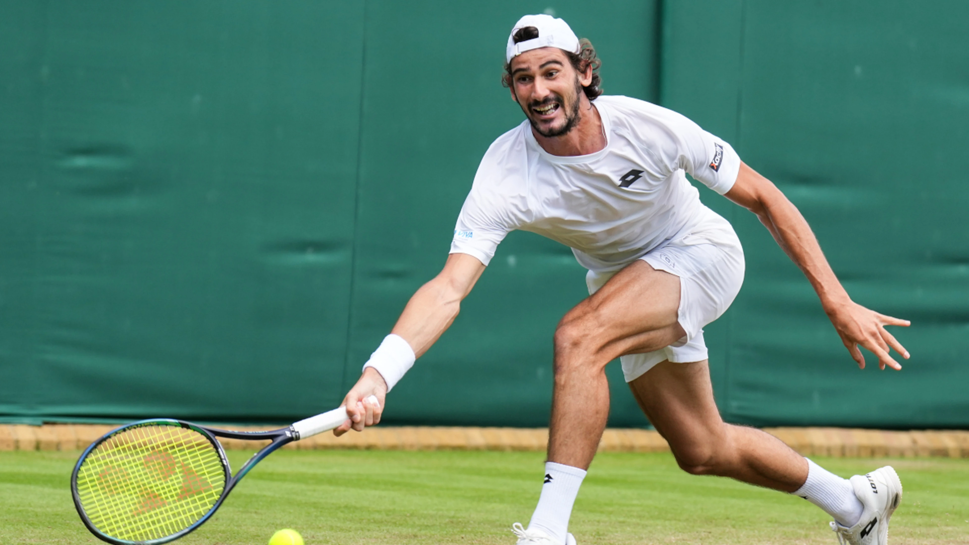 Harris bows  out of  Wimbledon after gallant fight