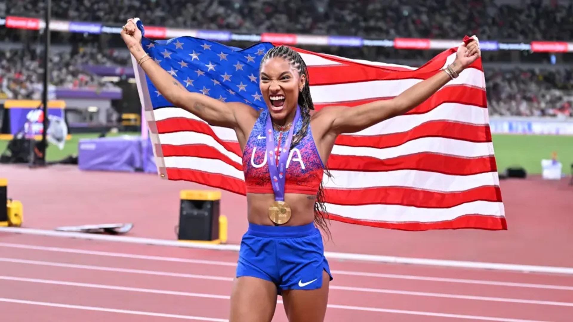 STUNNING RUN: Jefferson-Wooden surges to women's 100m world title