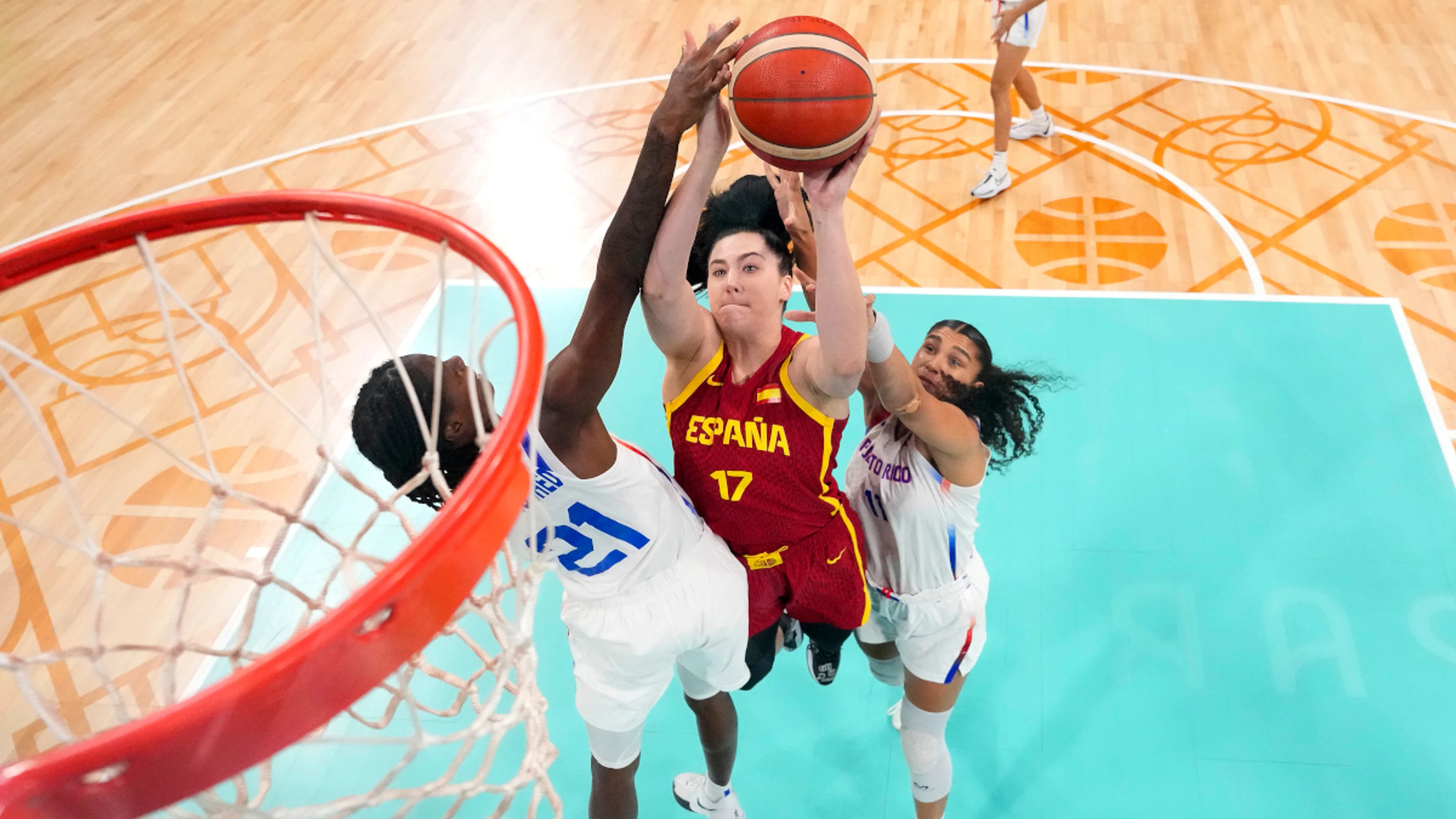 Spain edge Puerto Rico and Serbia down China to earn quarterfinal berths