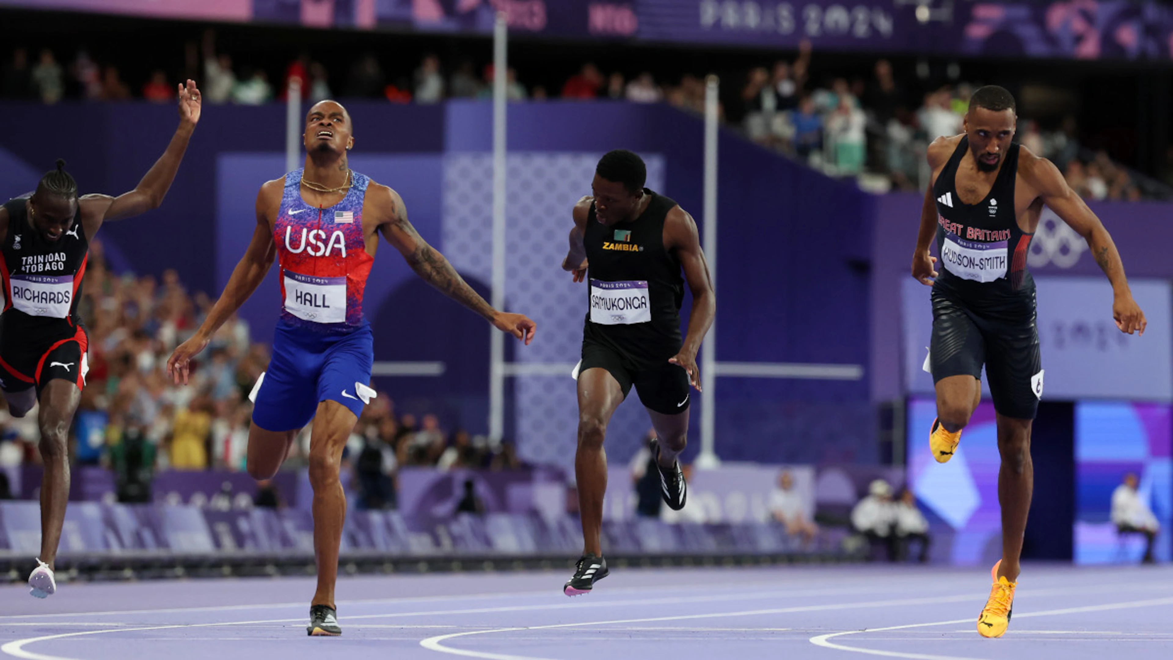 Hall lunges to win Olympic 400m title, bronze for Zambia's Samukonga