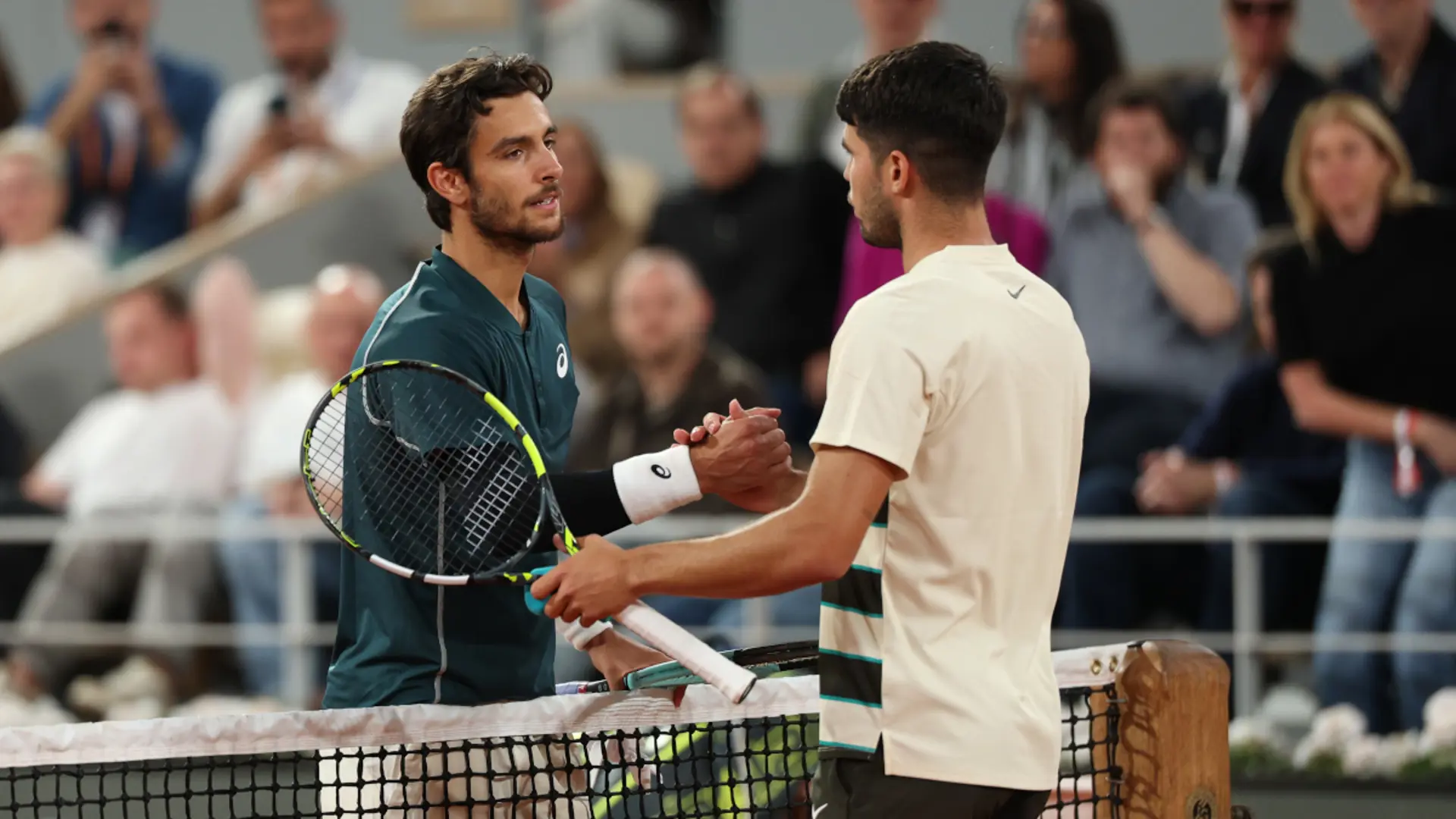 Reigning champion Alcaraz into French Open final as Musetti retires
