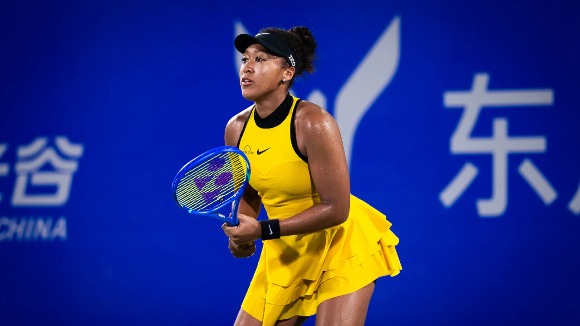 Tearful Osaka battles injury to reach Japan quarterfinals