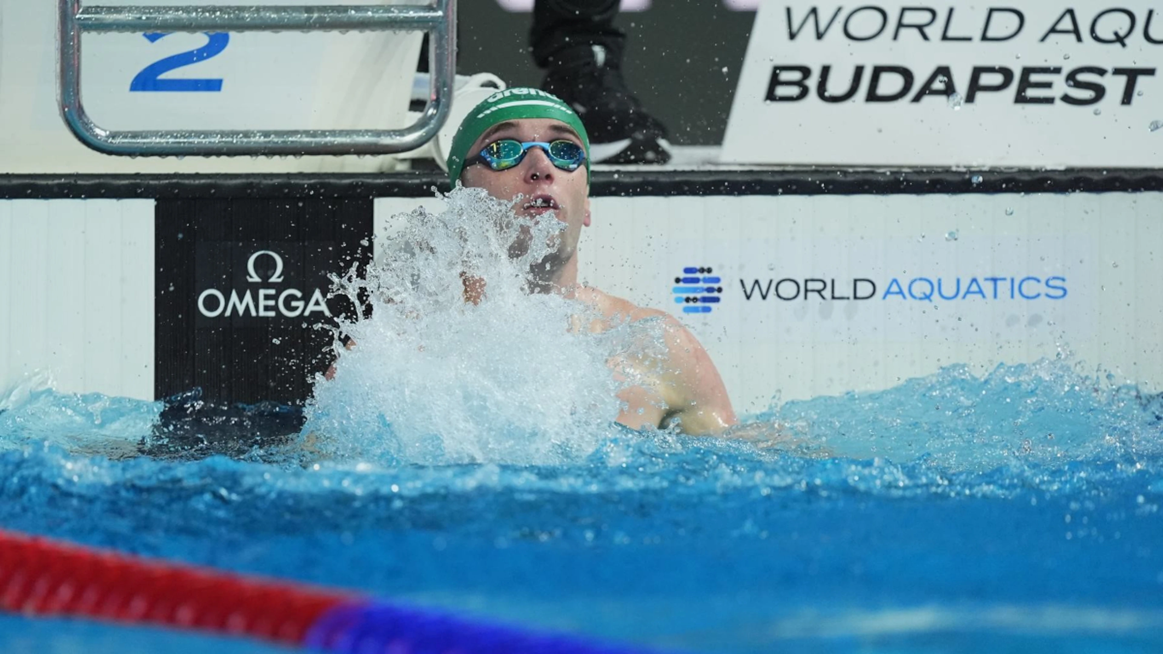 Smith breaks world junior record en route to breaststroke final 
