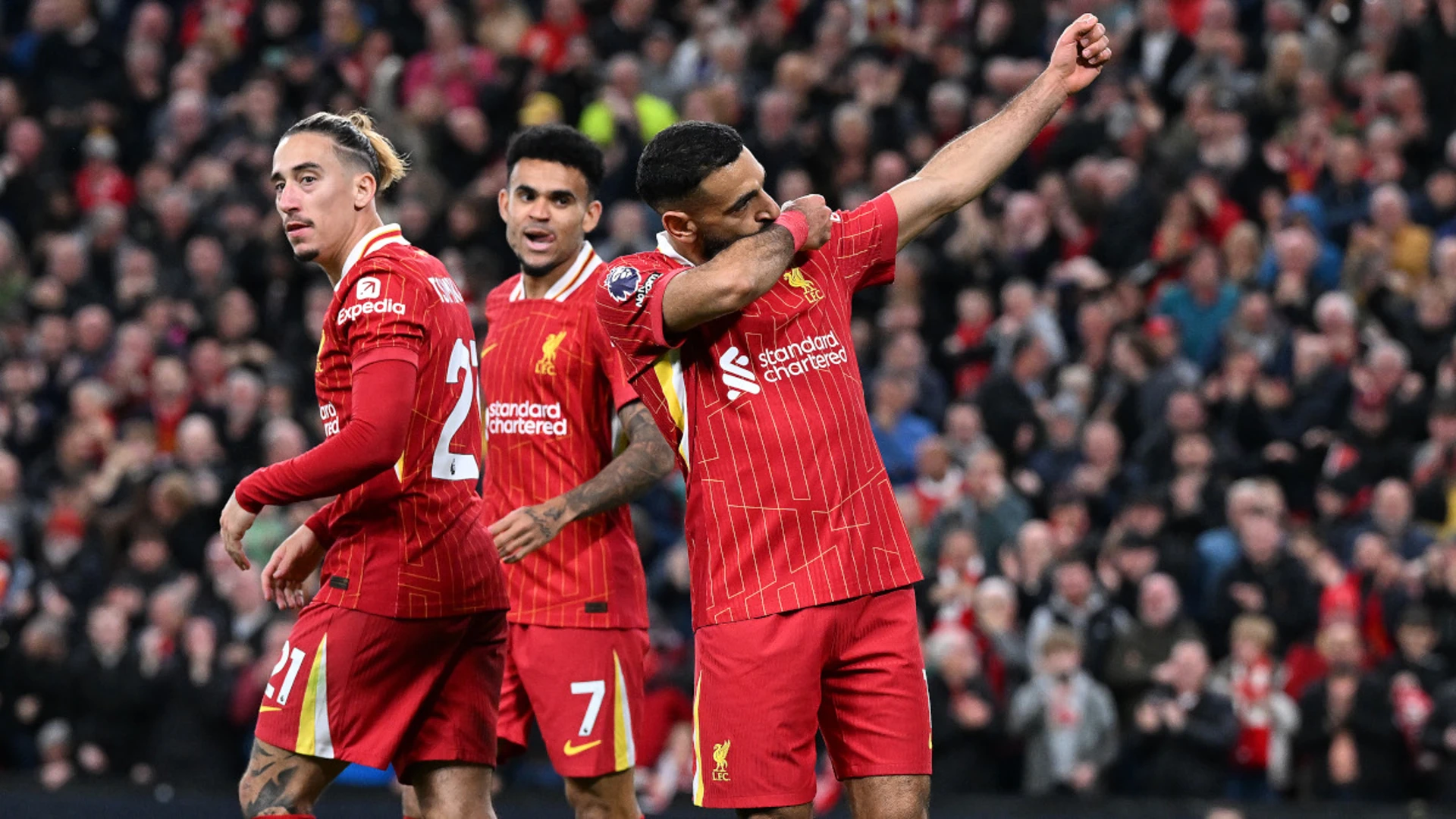 Salah strike beats Brighton to take Liverpool top