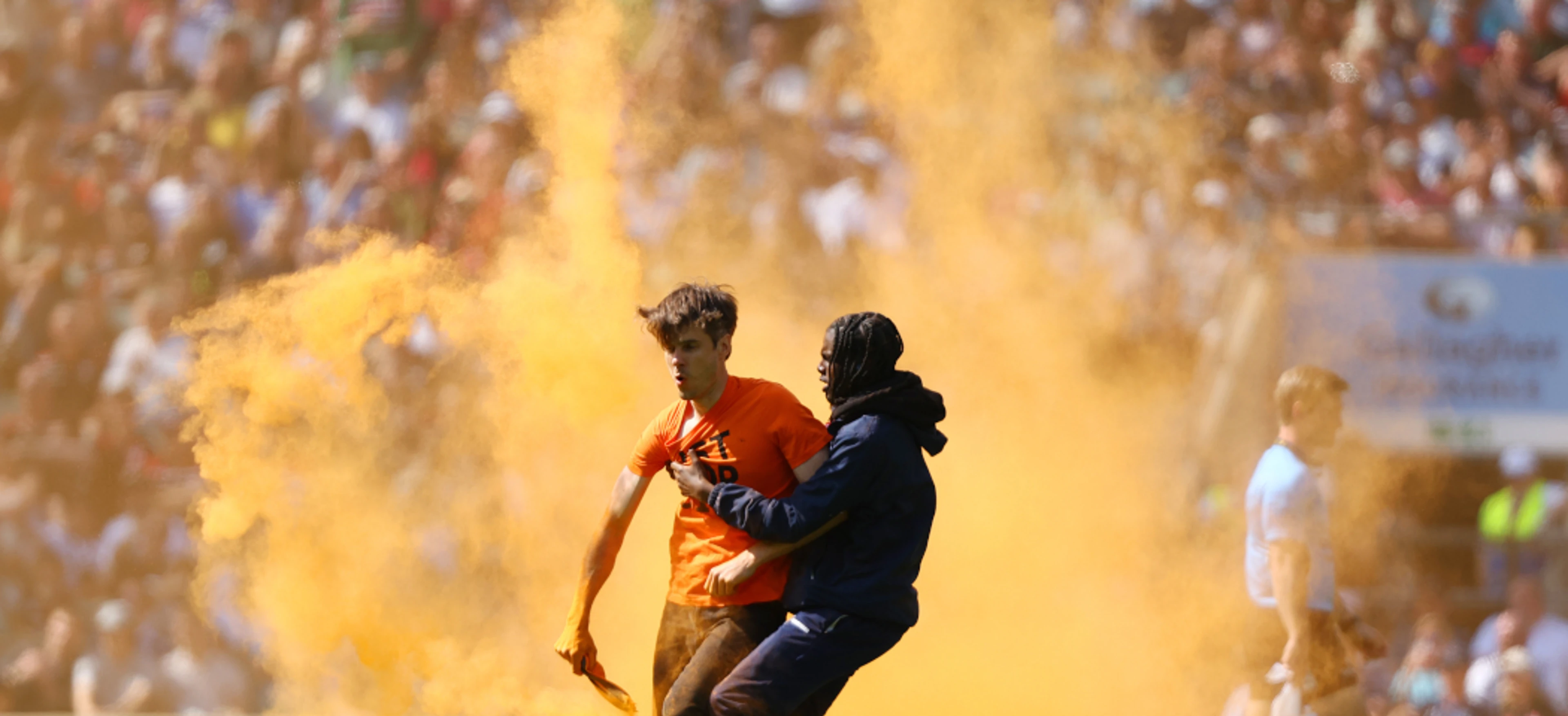 Protesters invade pitch and briefly hold up Premiership final