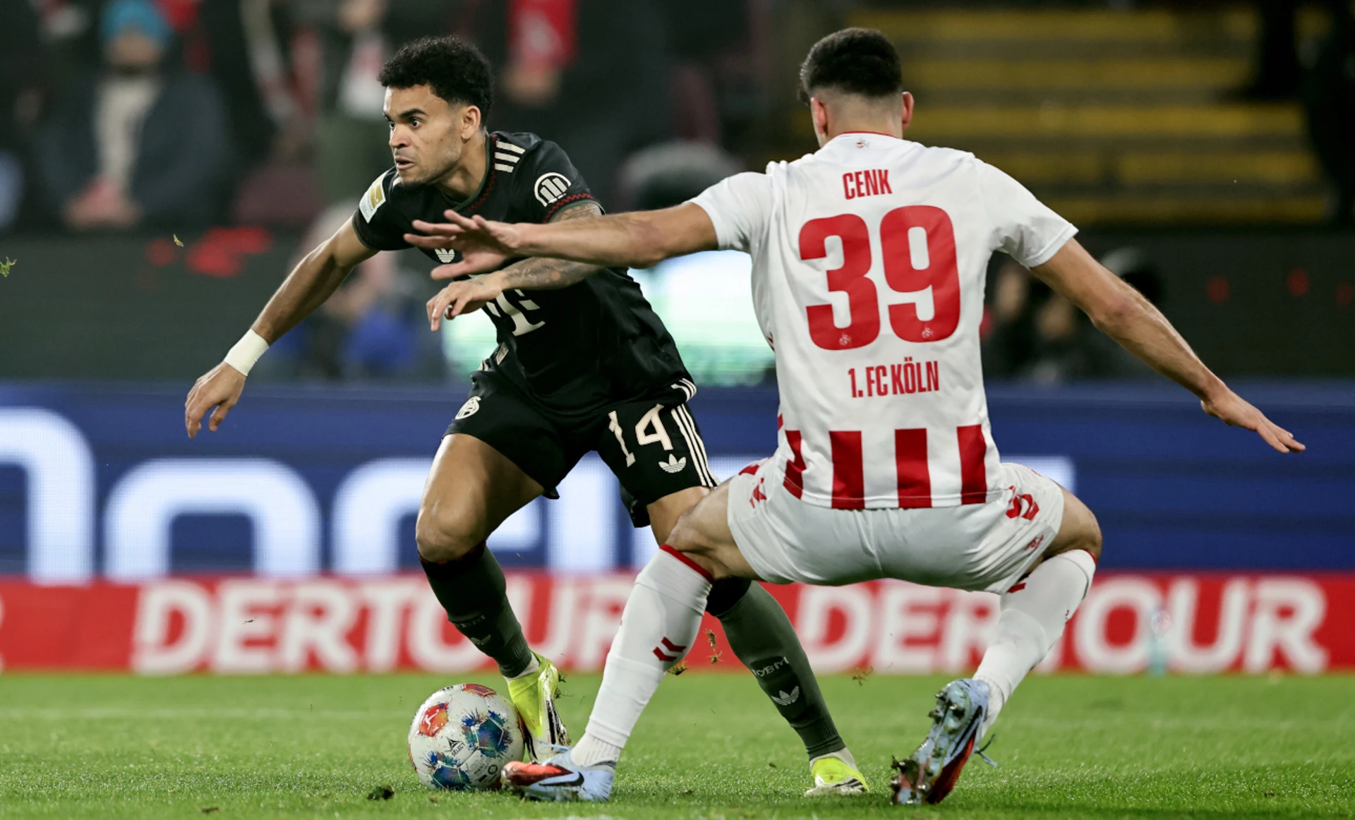 Bayern beat Cologne to move 11 points clear, Hearts bolster title bid