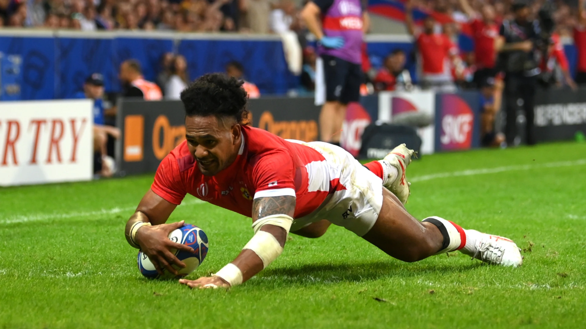 Seven-try Tonga bow out with World Cup win over Romania