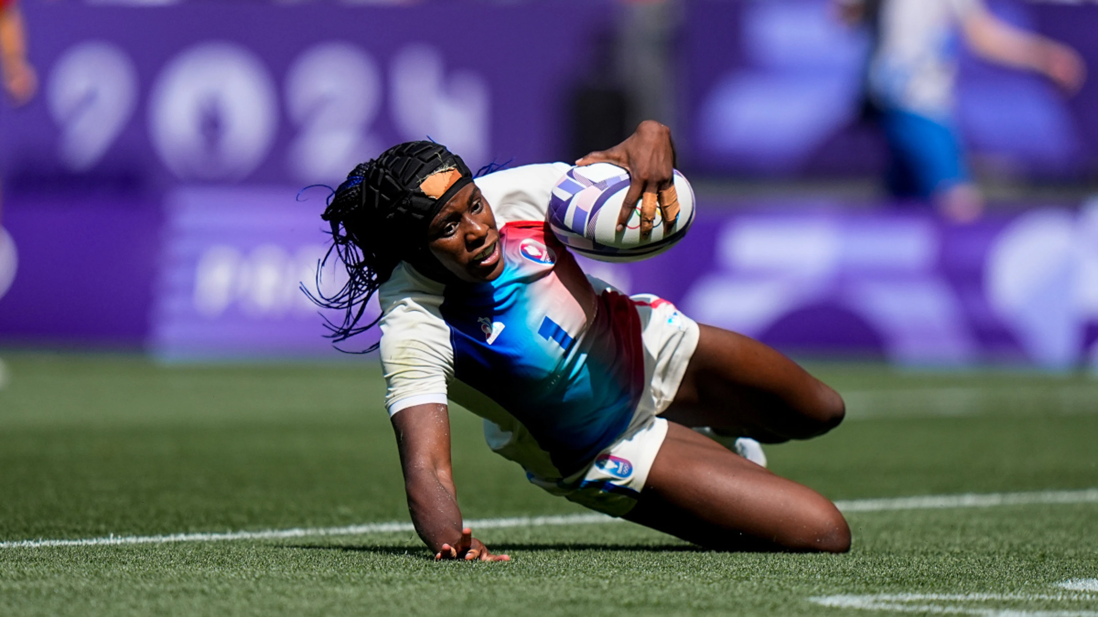 Four-try Okemba keeps French fans rocking