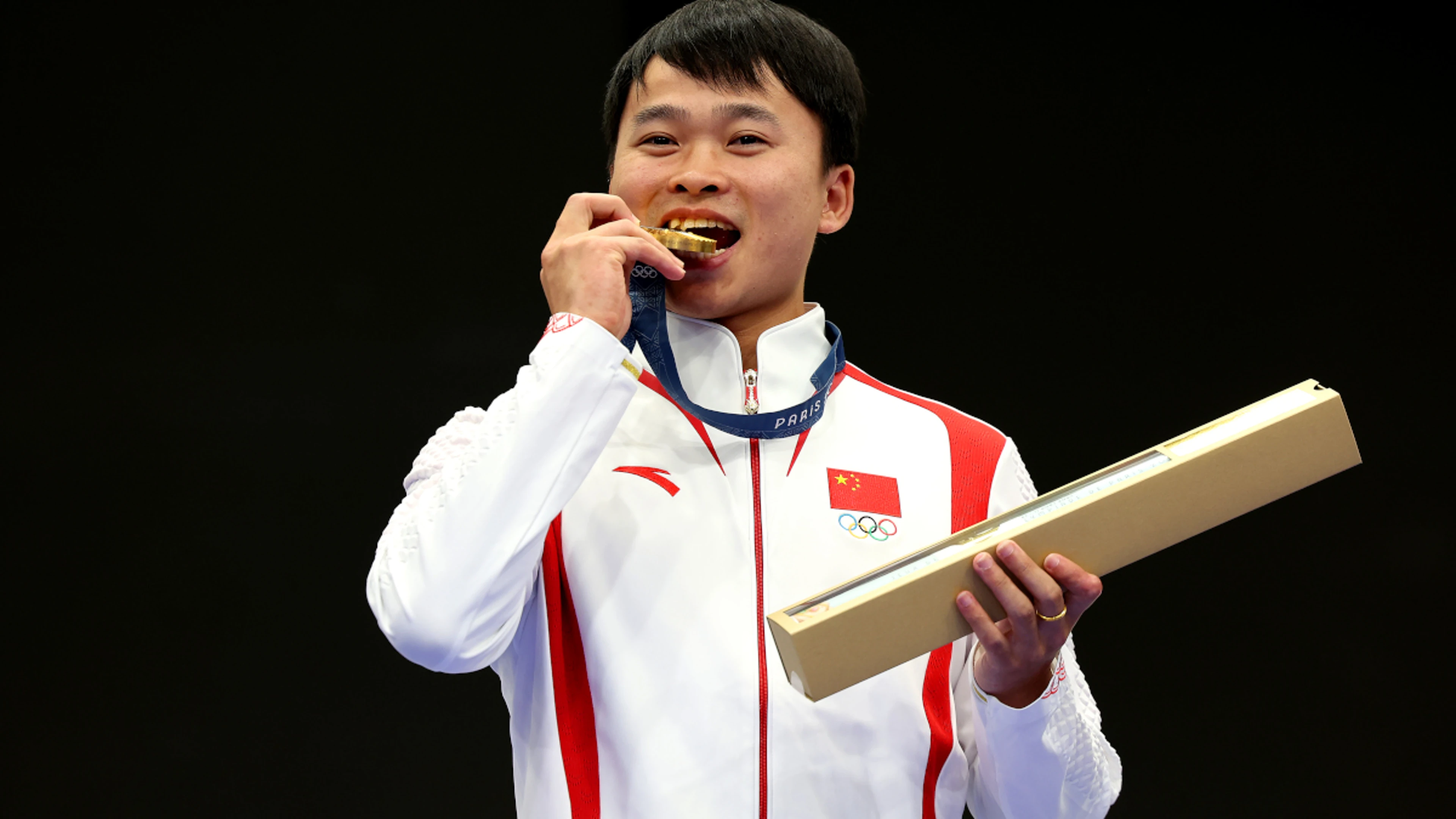 China's Xie shoots gold in dream debut