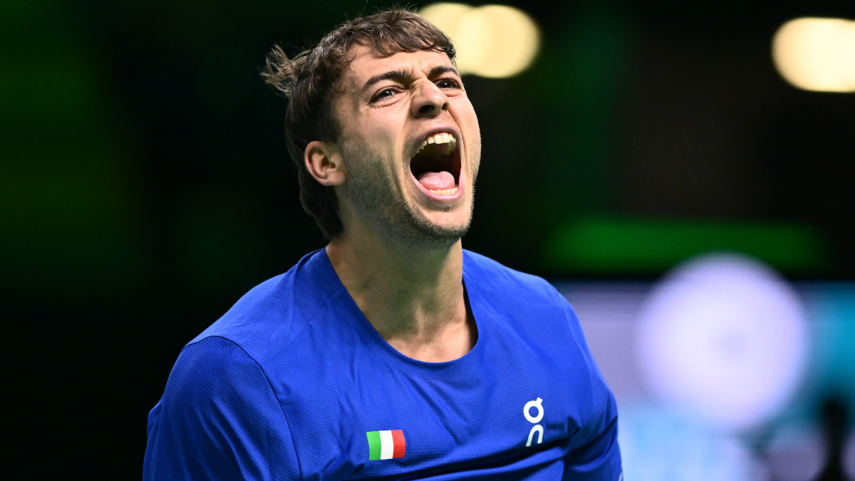 Battling Cobolli sends holders Italy into final
