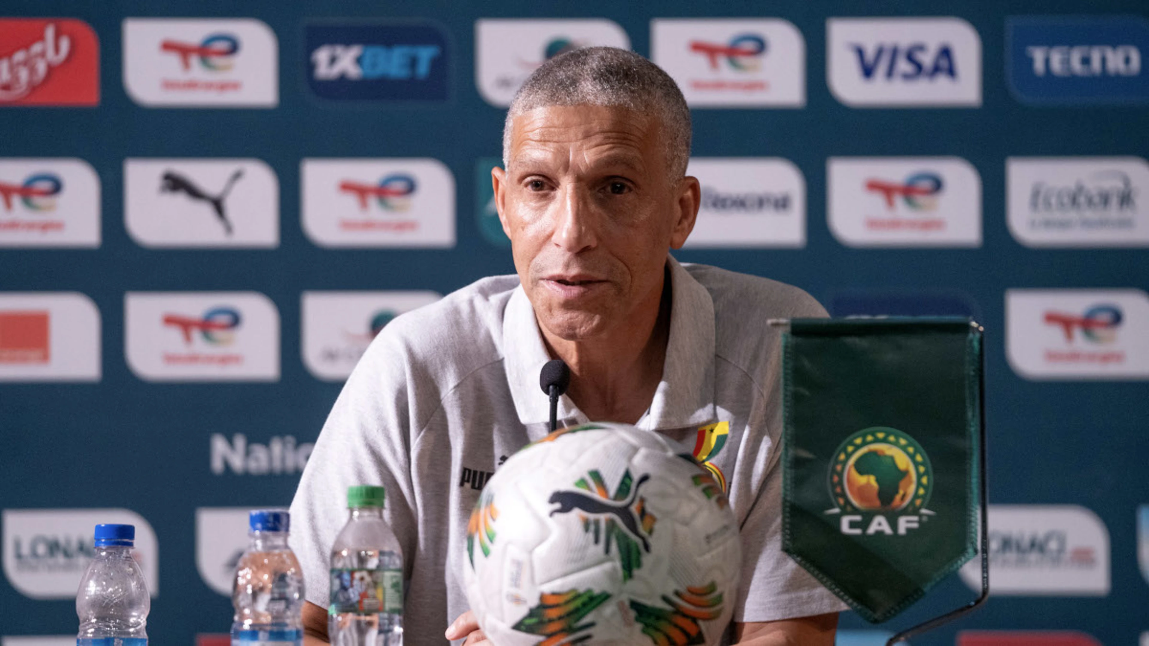 Ghana coach Hughton dodges blow from angry fan at team hotel