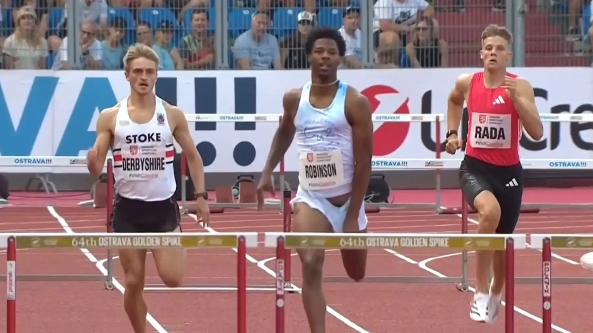 HURDLES BLOOPER: Robinson wins despite wardrobe malfunction