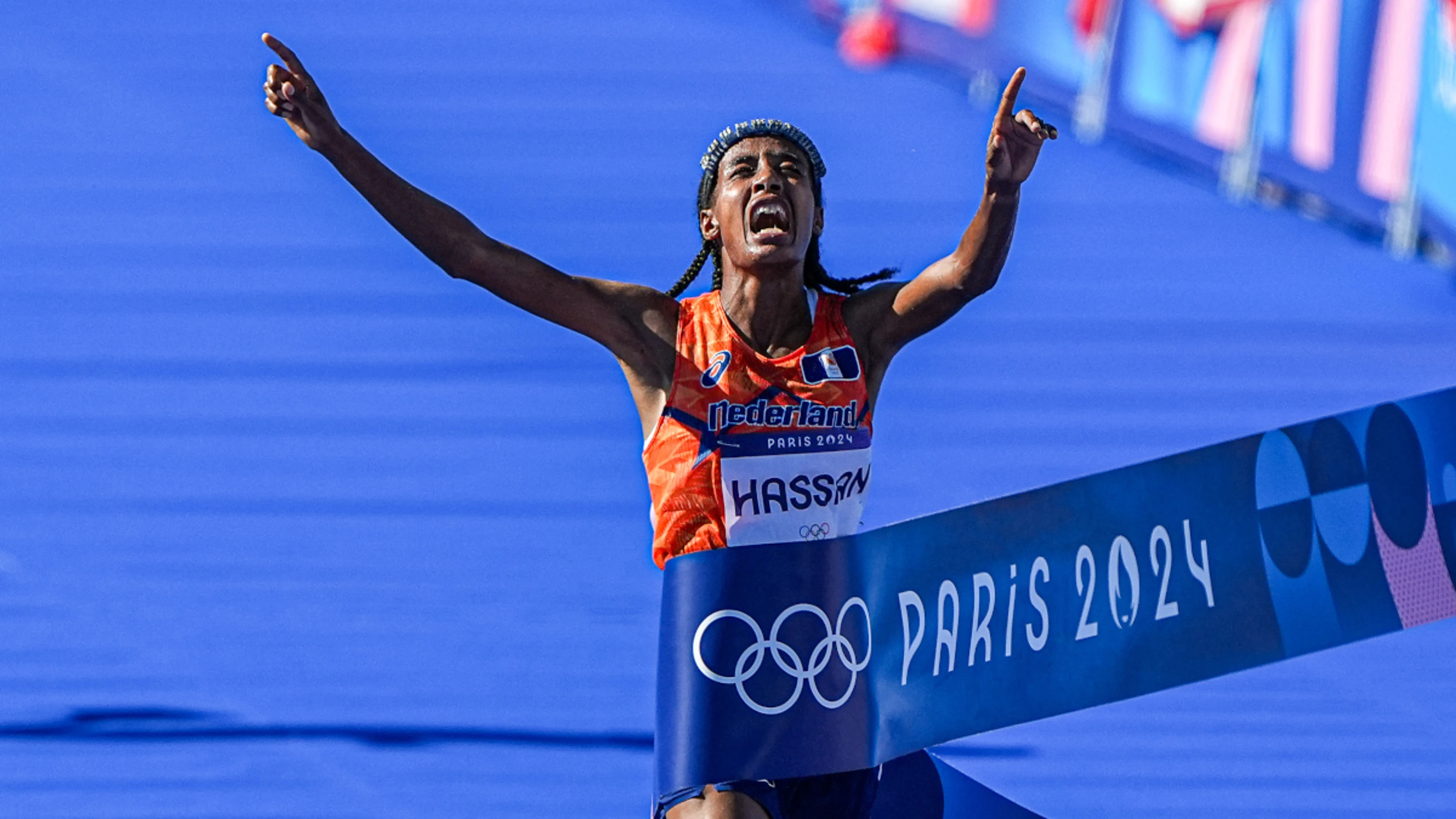 Hassan wins marathon as endurance gamble pays off