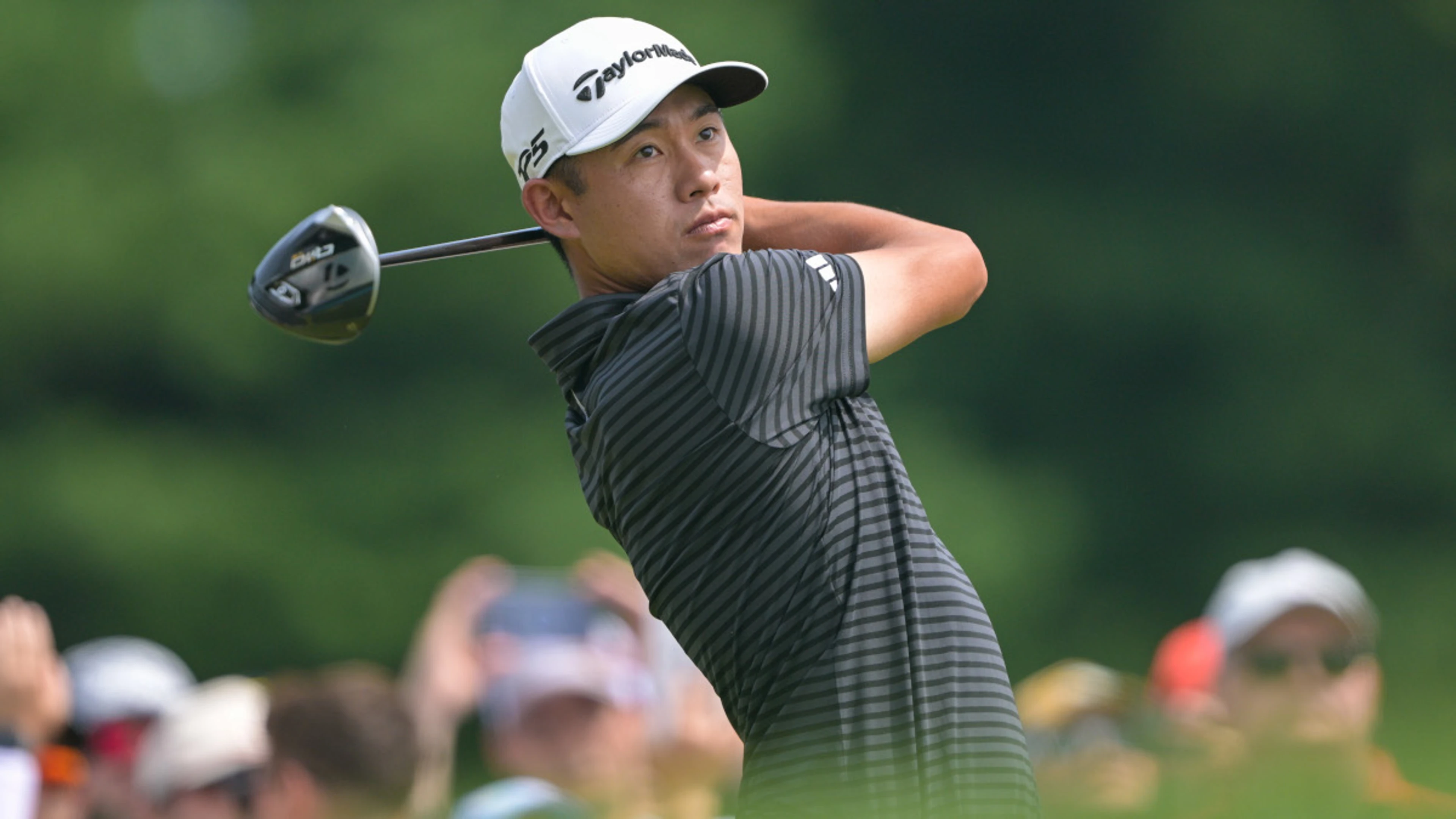 Morikawa puts former Cal teammate on bag at Rocket Classic