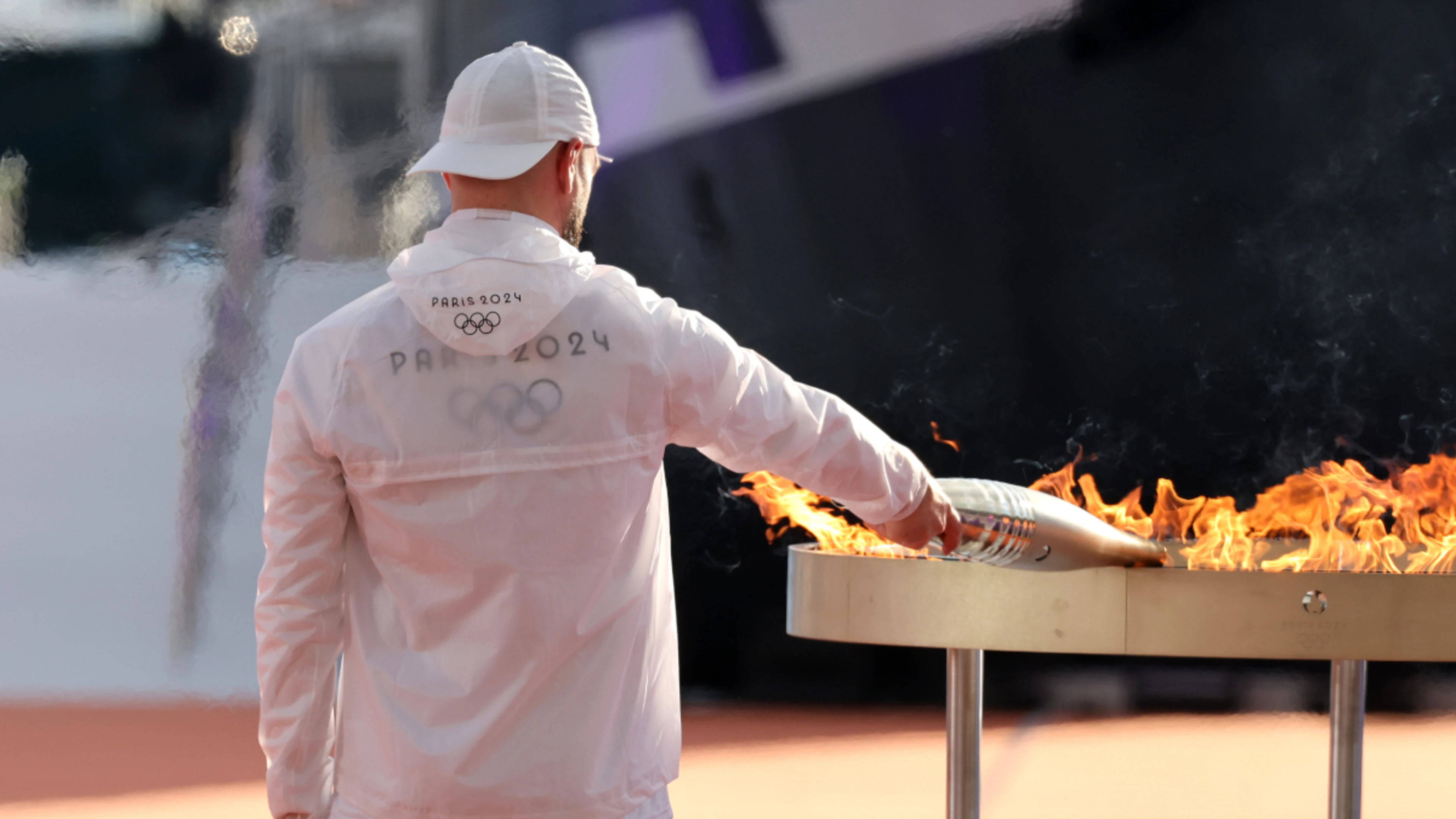 Paris Olympic flame begins relay across France