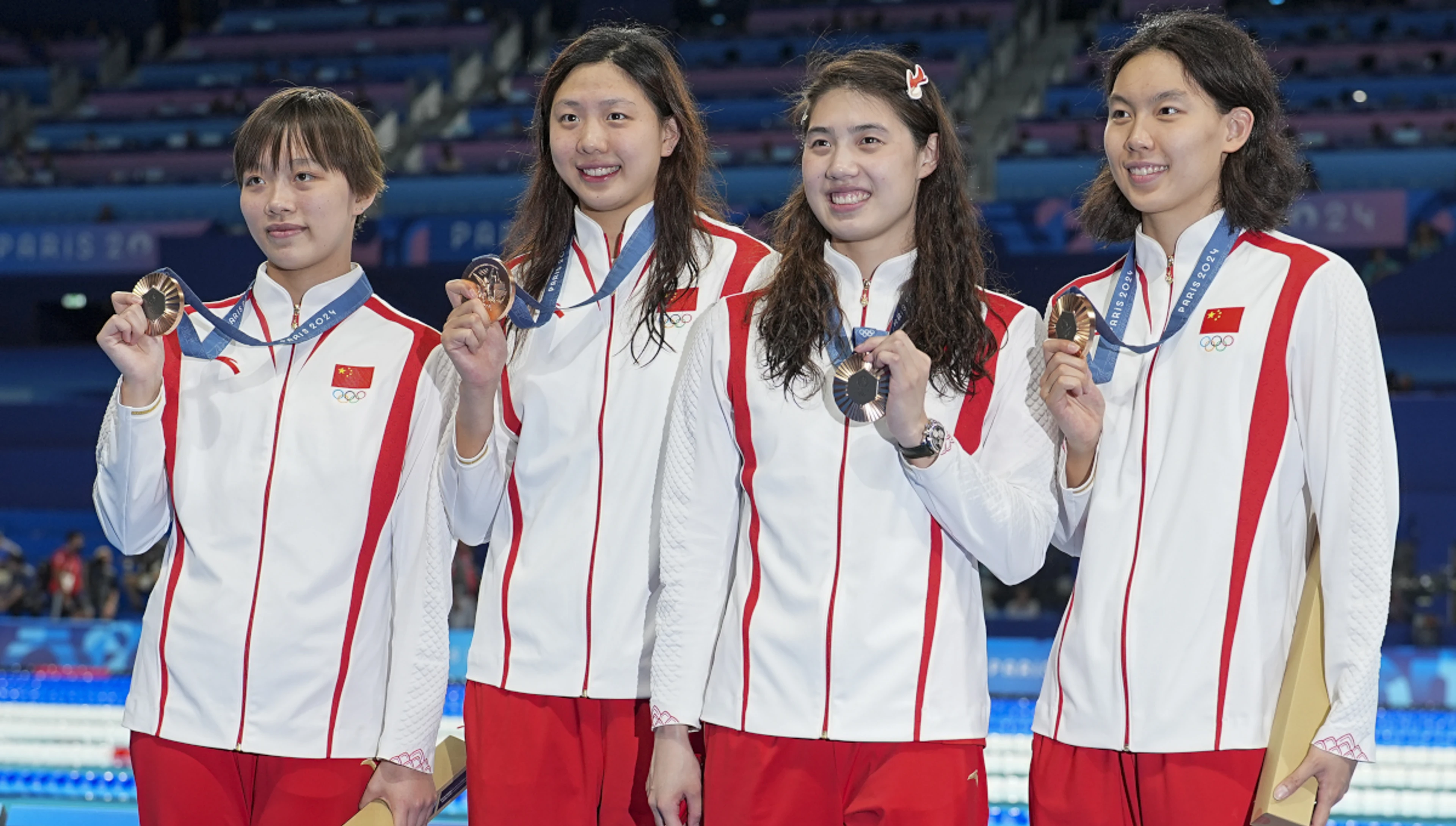 China shrug off doping controversy, win 12 Olympic swimming medals