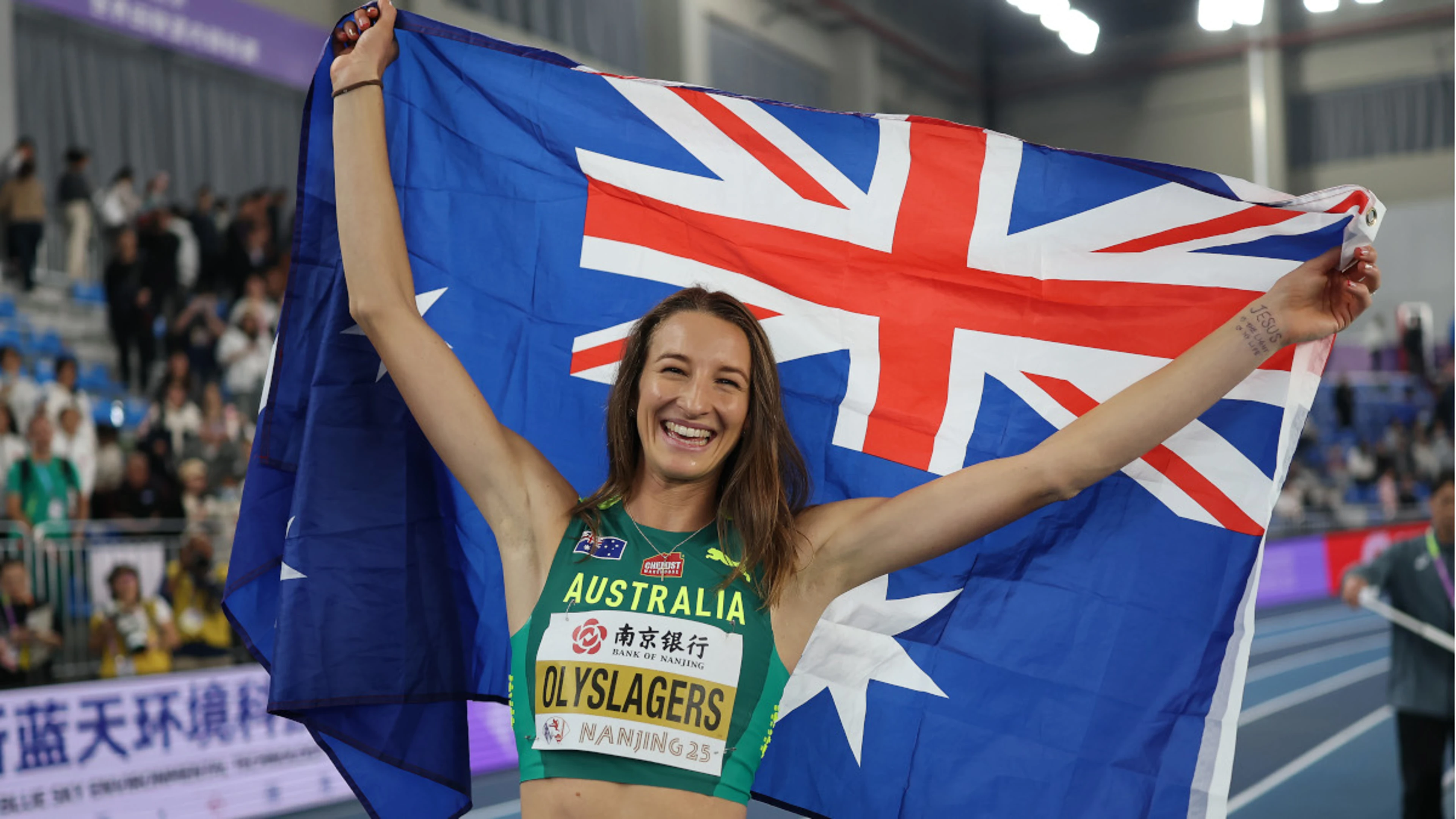 Australian Olyslagers retains world indoor high jump title