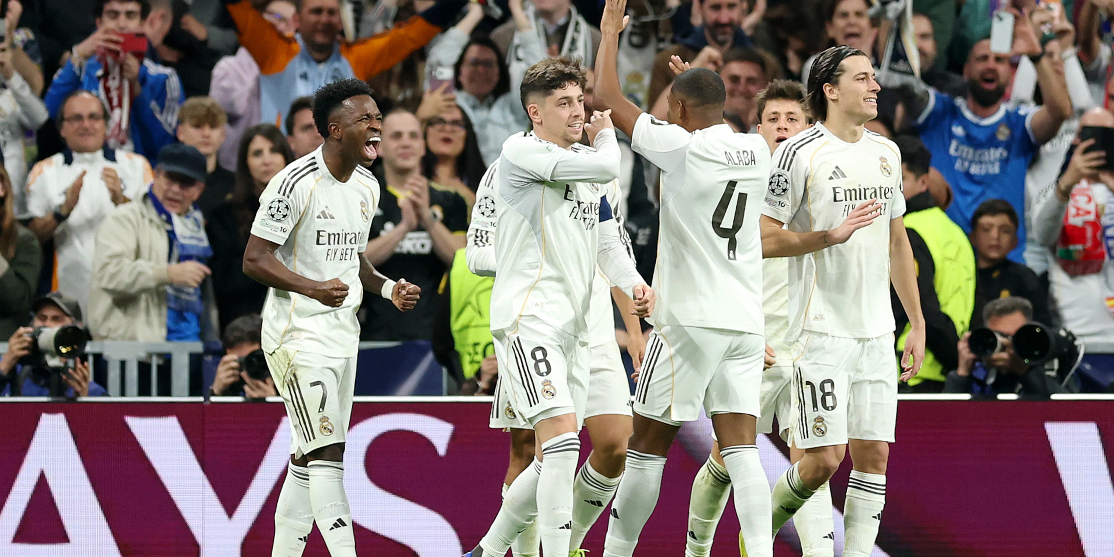 Real Madrid beat Benfica to reach Champions League last 16