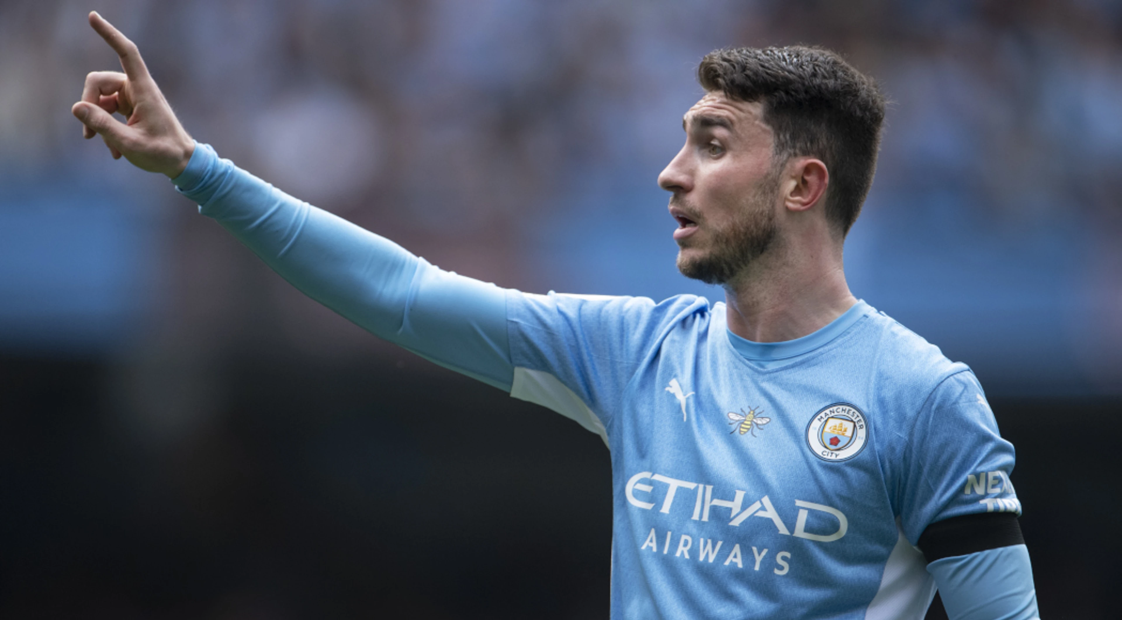 Laporte to miss start of Man City's title defence