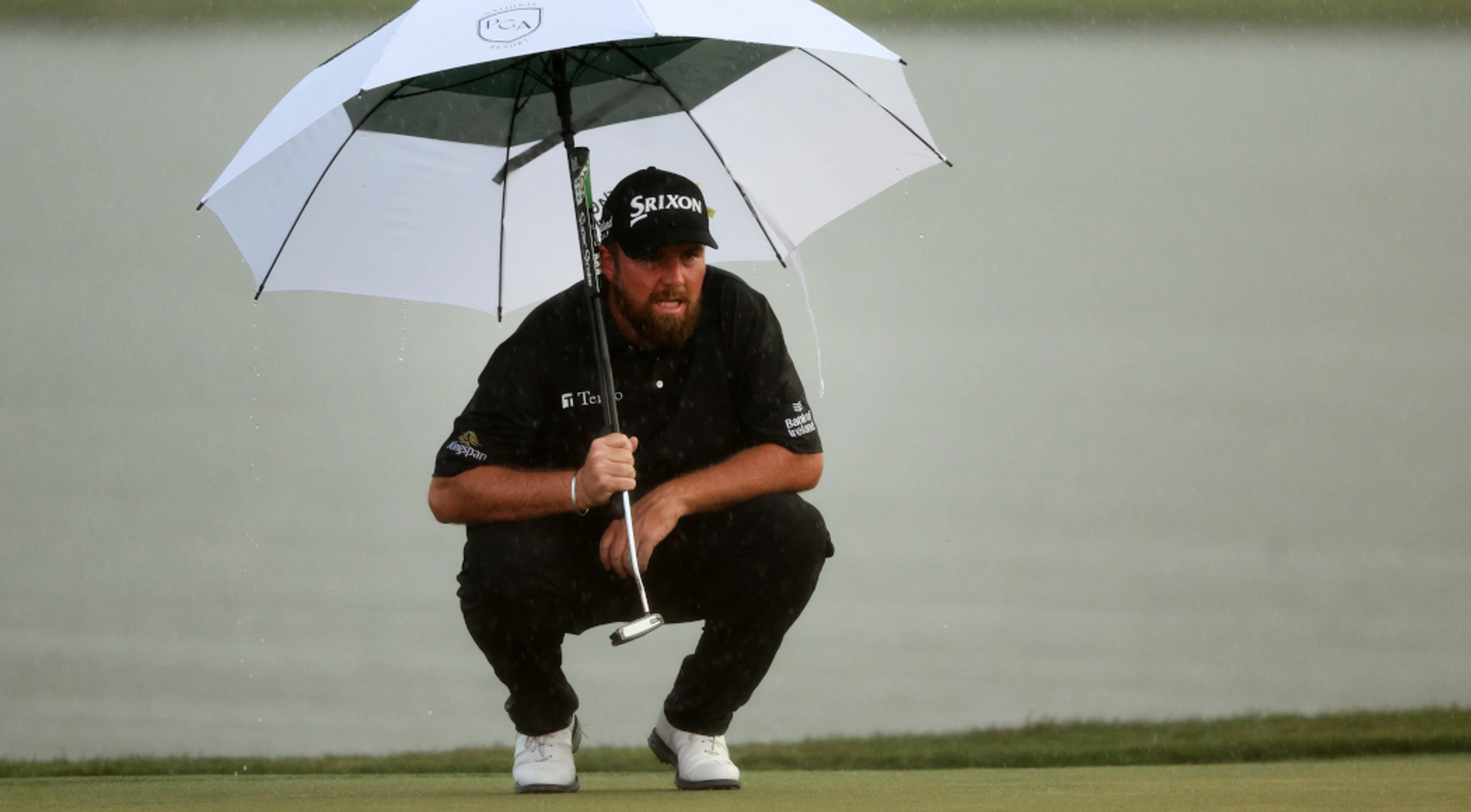 Honda Classic 'stolen from me' by downpour - Lowry