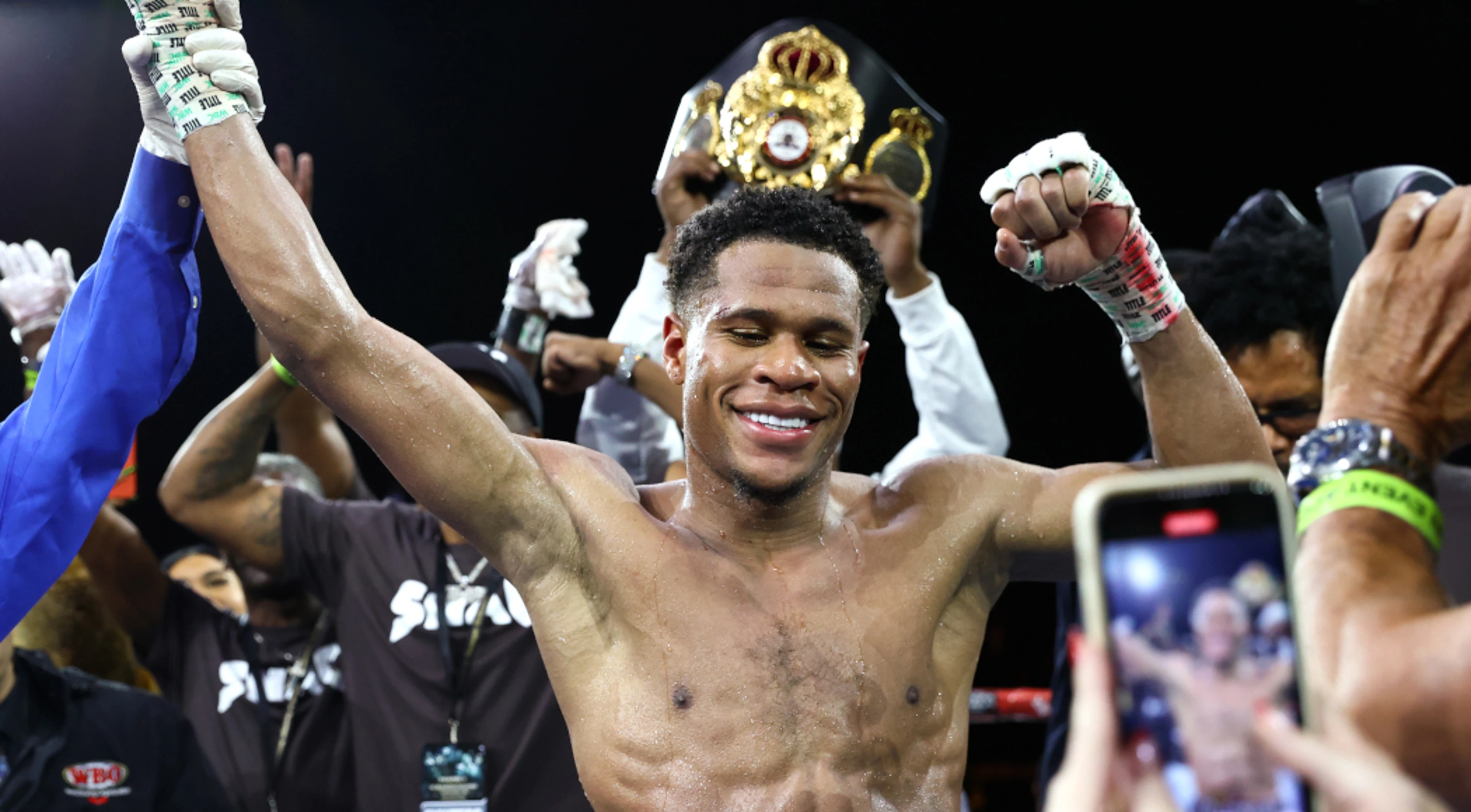 Haney defends WBA, WBC, WBO and IBF lightweight titles