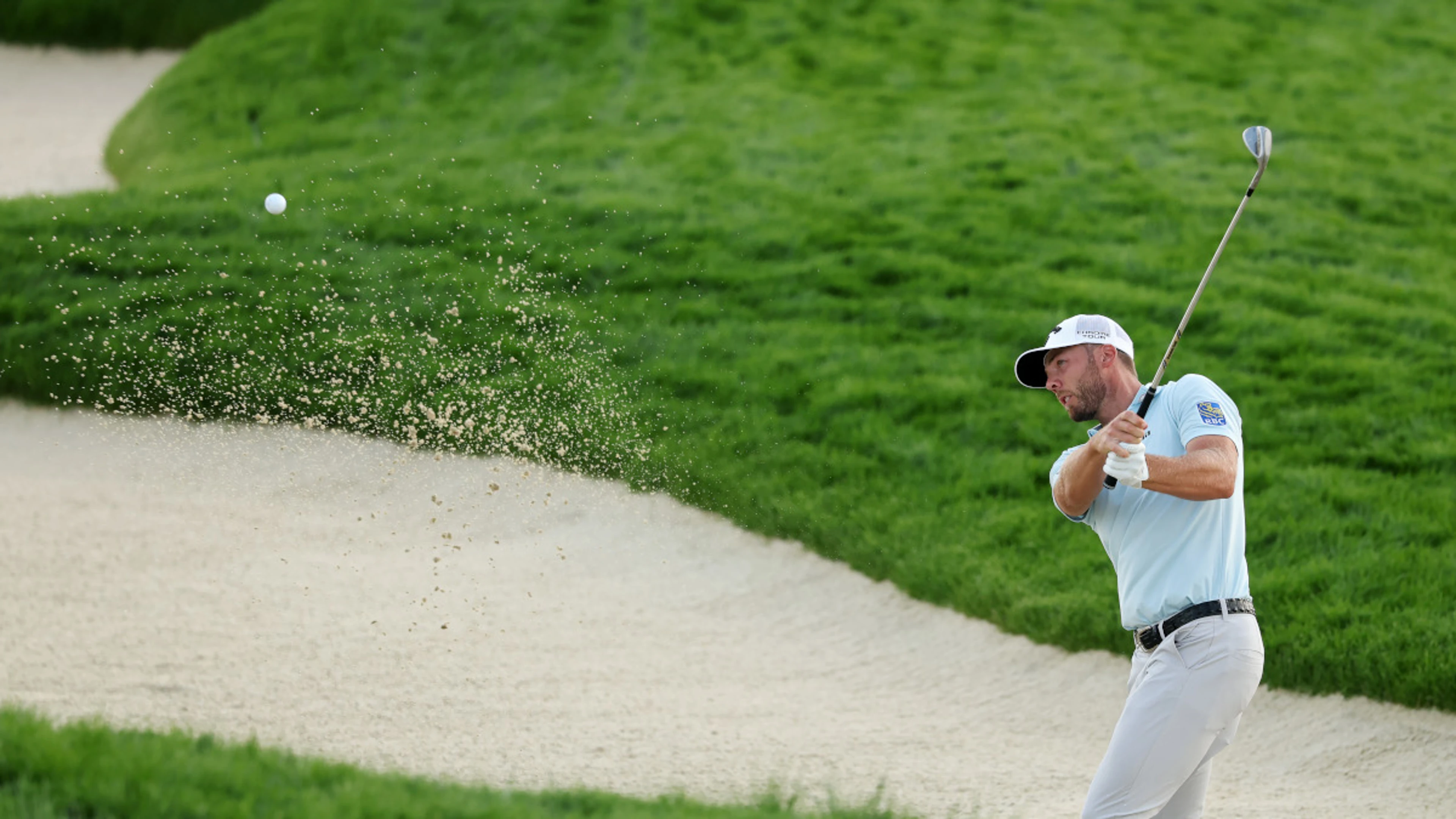 US Open resumes with Burns leading at rain-soaked Oakmont