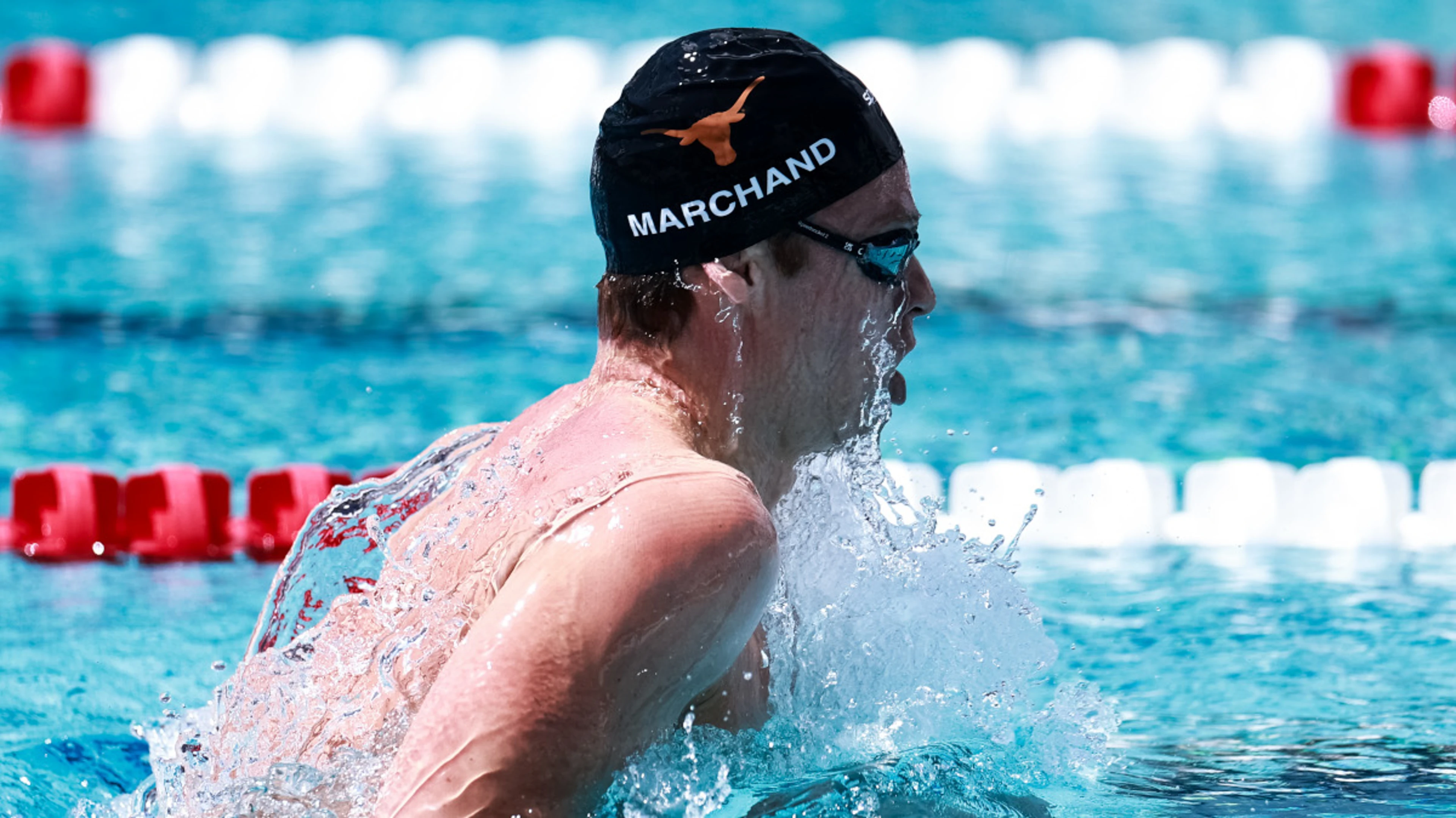 Marchand, McIntosh top bill at swimming worlds with 2028 on minds