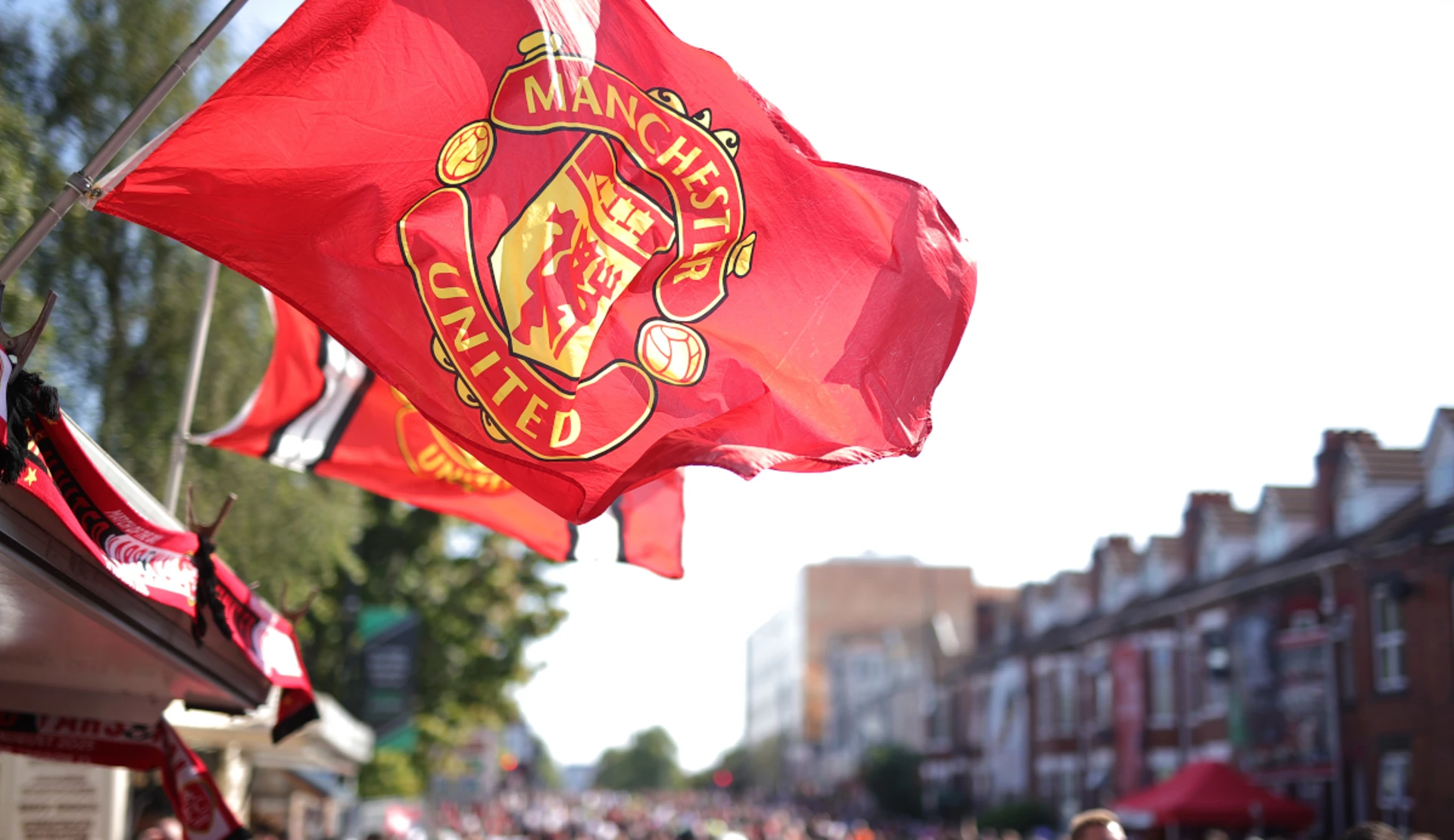 Manchester United posts sixth year of net loss, forecasts revenue dip