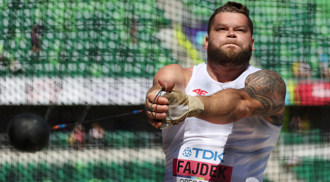 Polish hammer rivals Fajdek, Nowicki advance as worlds get subdued start