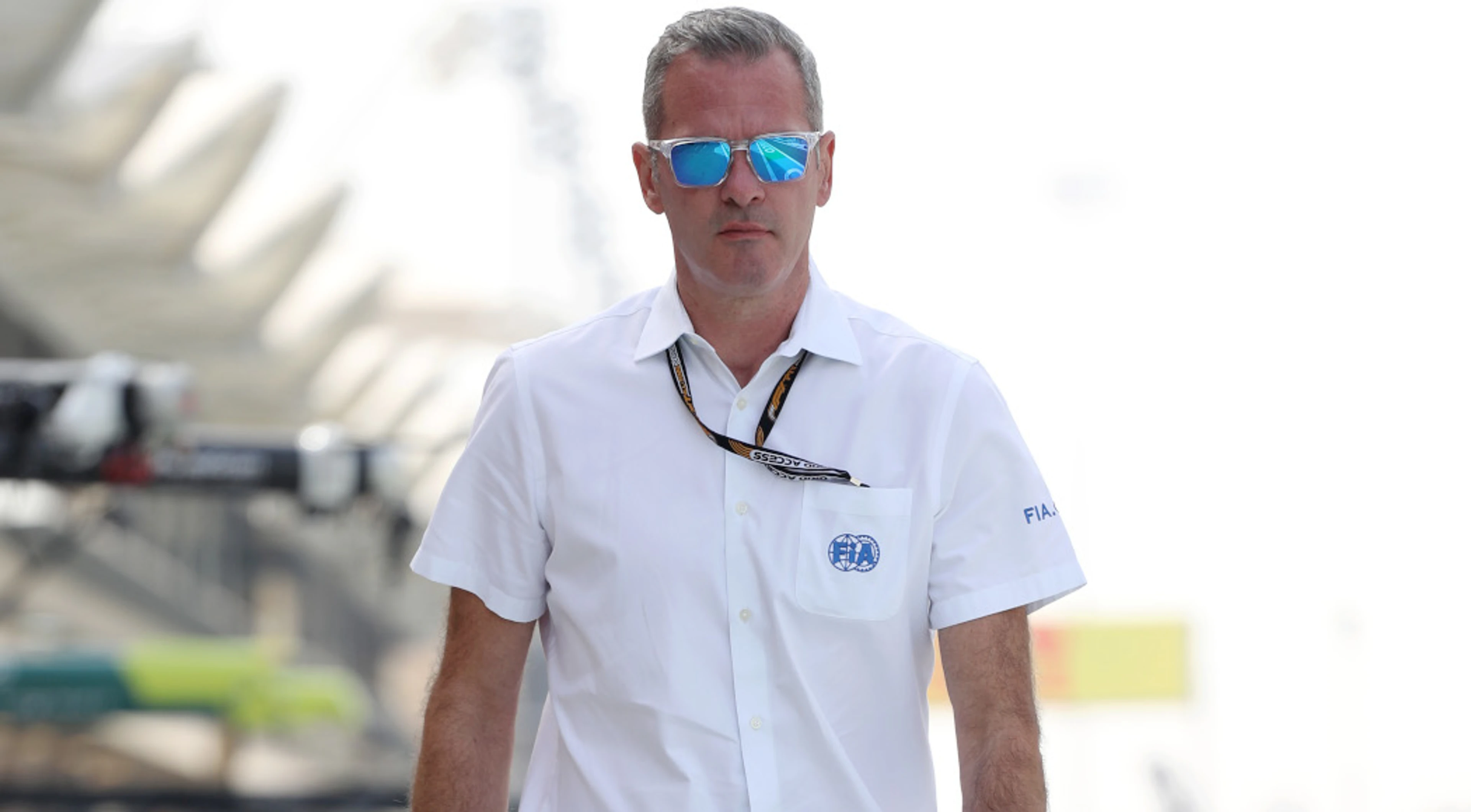 Celebrating F1 team members told to stay off pitwall fence