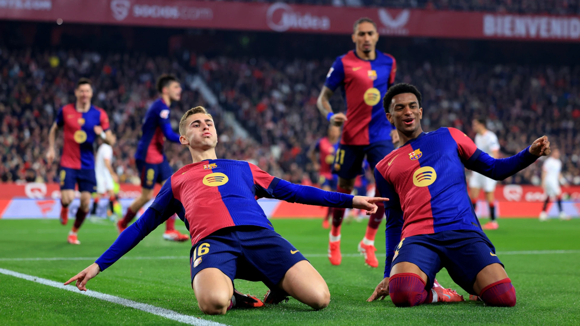 Barca rout Sevilla to maIntain title charge