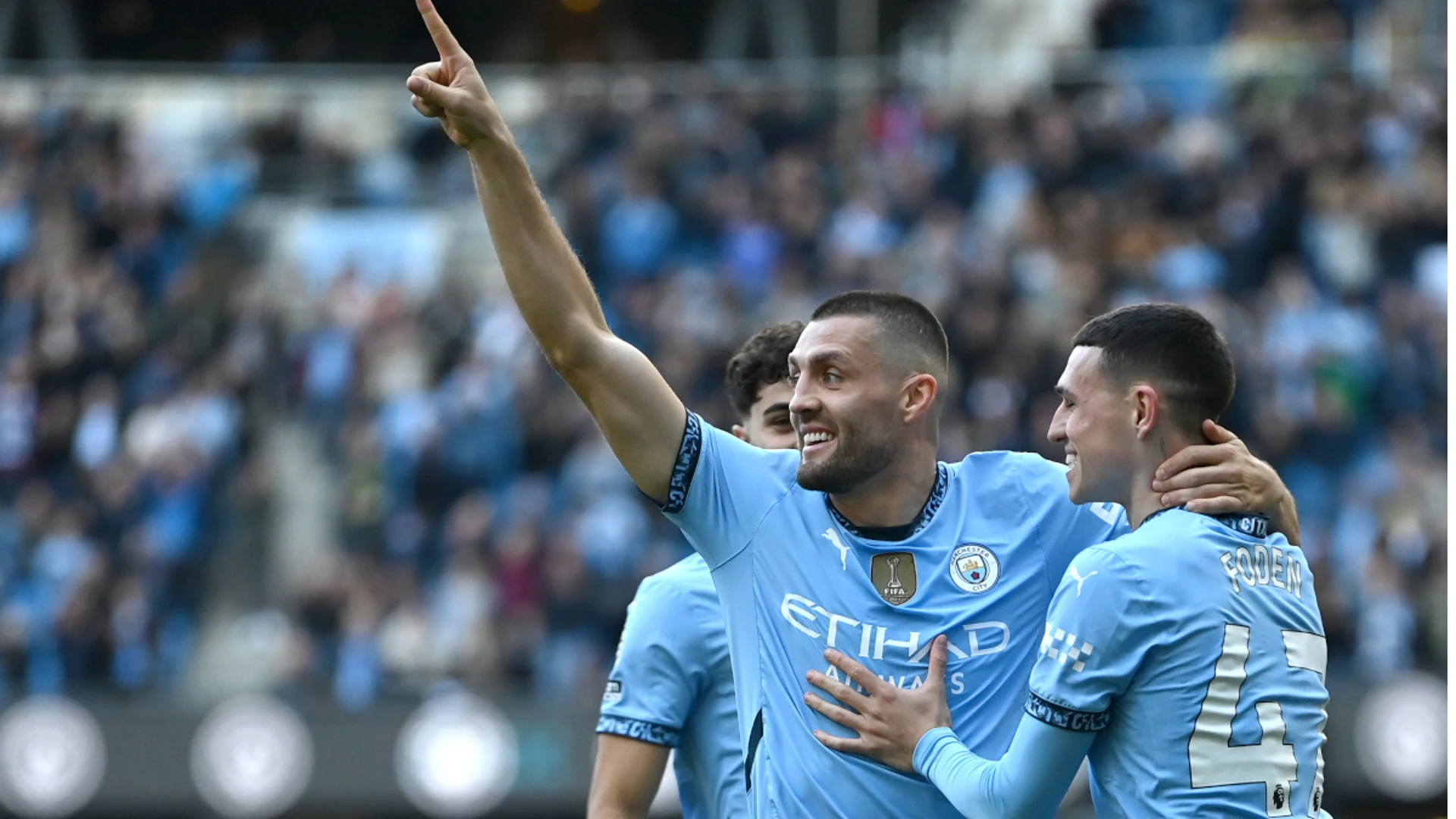 Man City sink Fulham to get title bid back on track