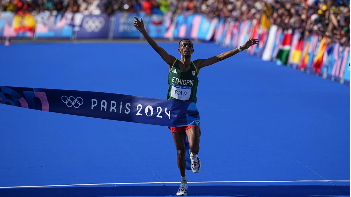 Ethiopia's Tola wins Olympic men's marathon, Kipchoge withdraws