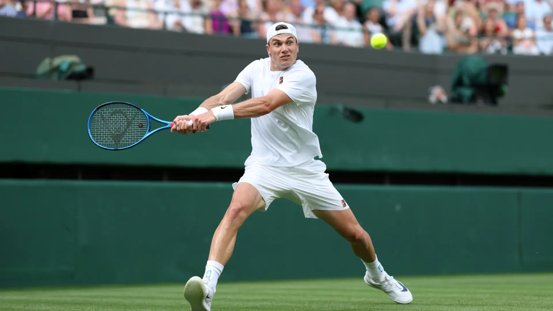 Britain's Draper races past injured Baez in Wimbledon opener