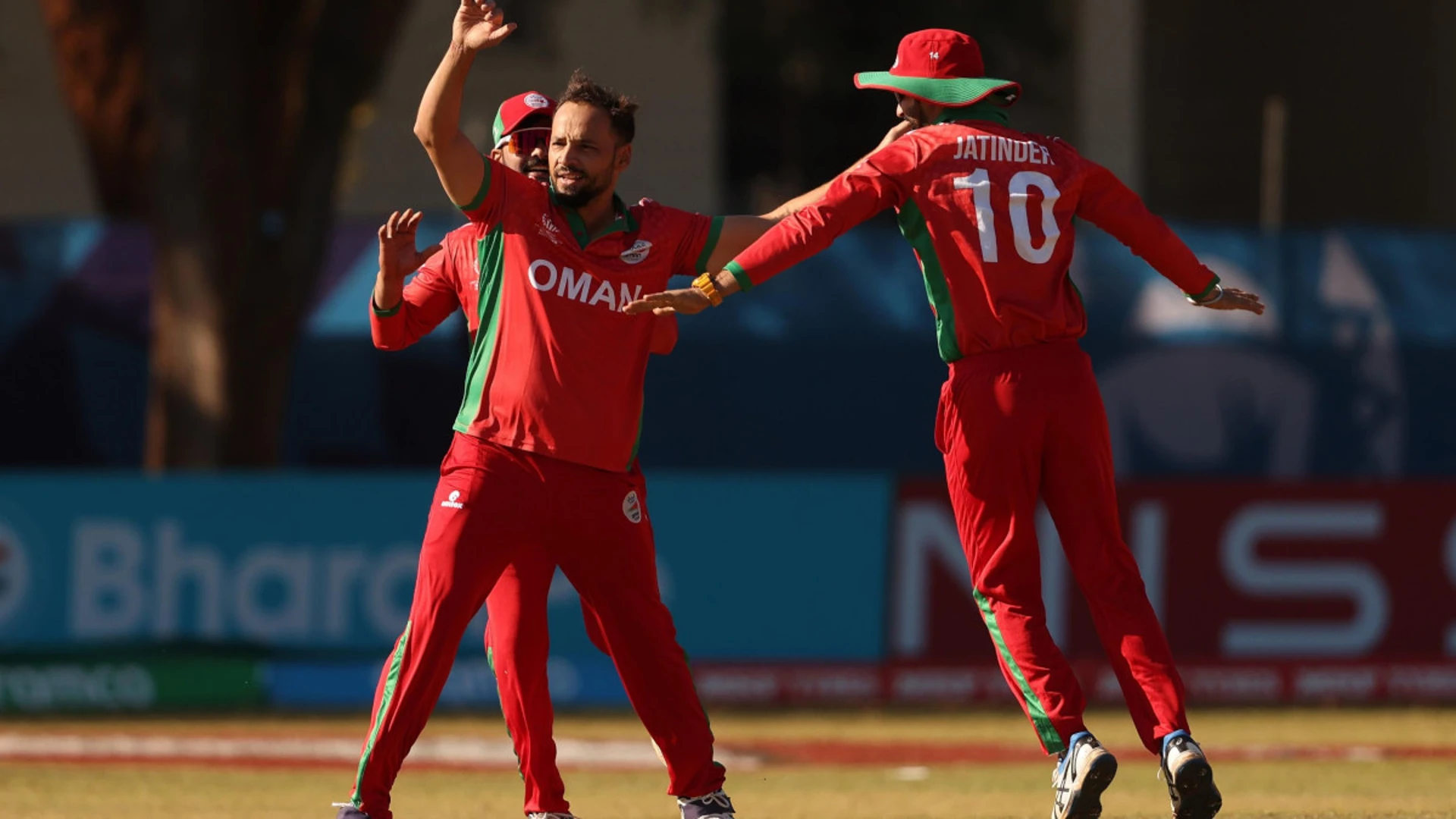 Oman coast to second victory