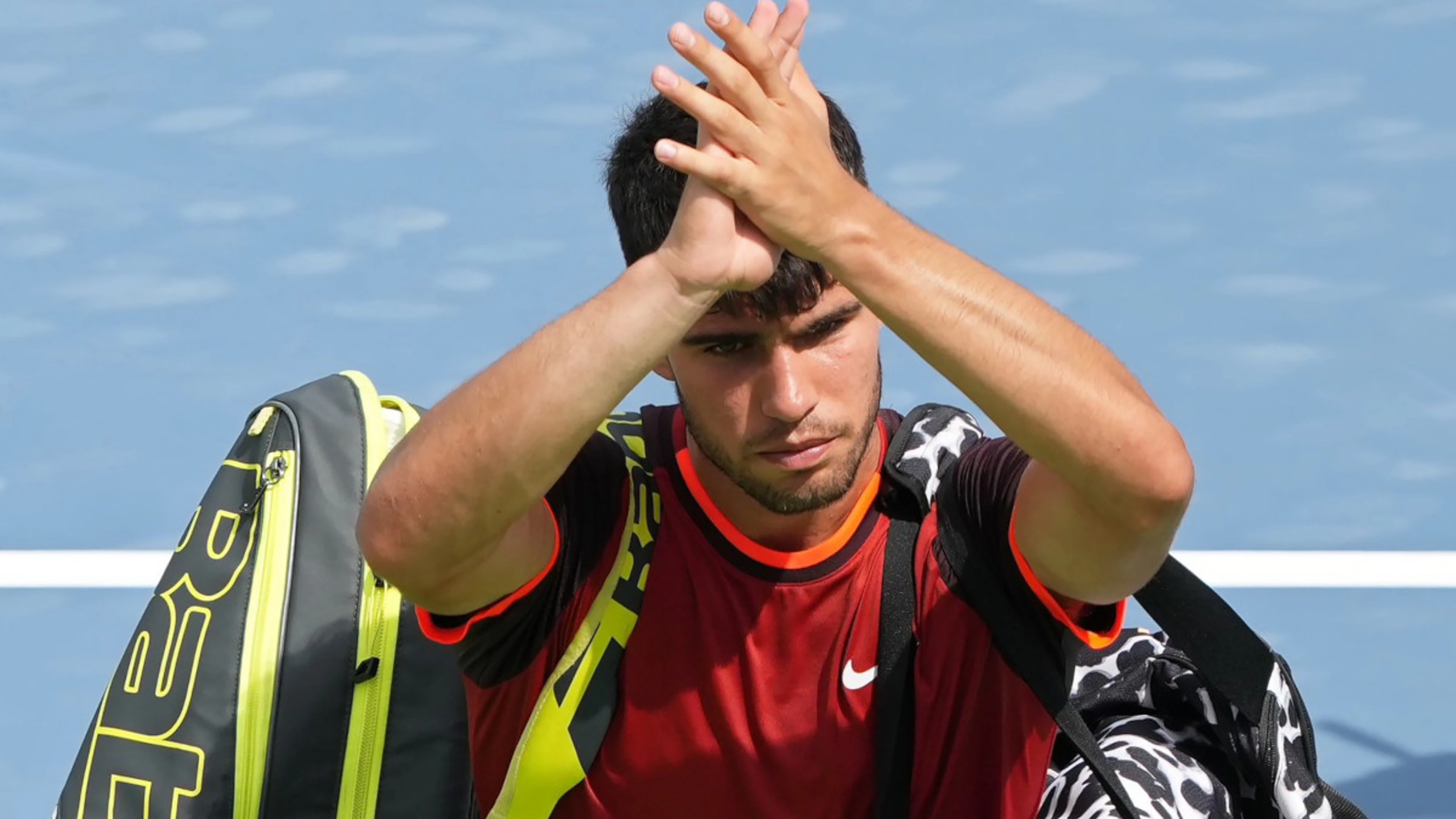 Alcaraz says sorry for racquet smash in 'worst' career loss