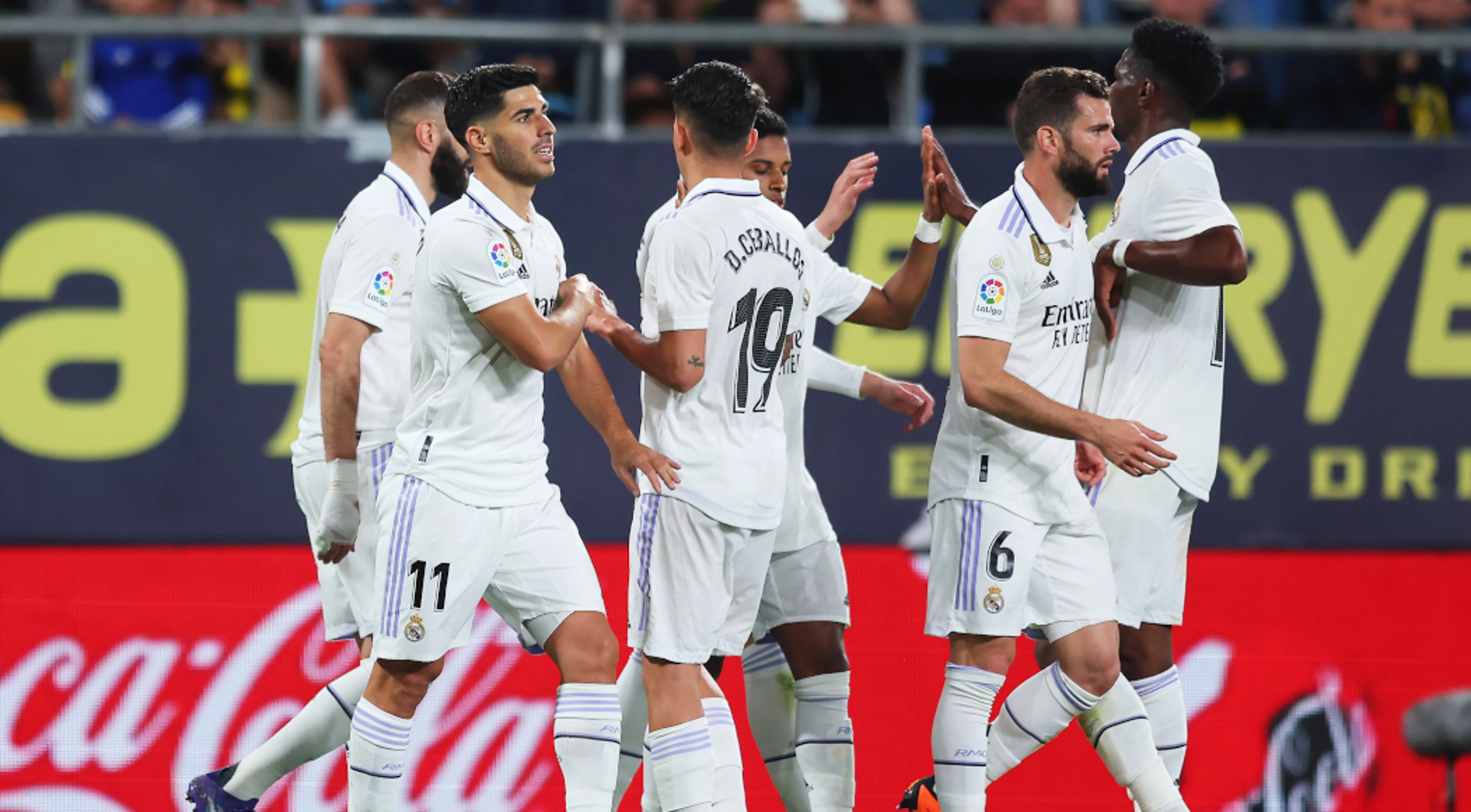 Nacho and Asensio score late to give Real Madrid win at Cadiz